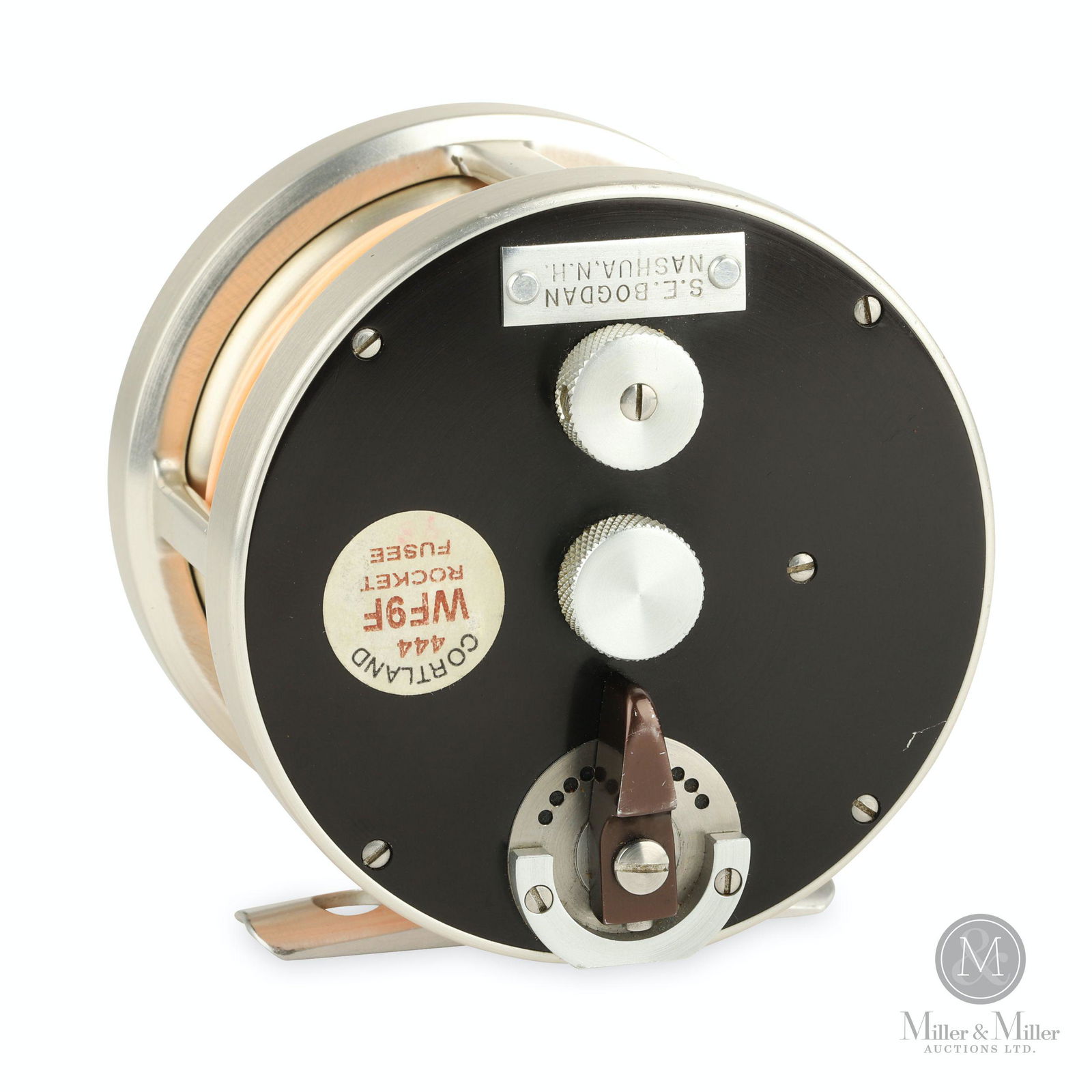 S.E. Bogdan, No. "0" Fly Reel: American. Left hand. Includes additional reel spool. Tagged, "S.E. Bogdan Nashua, N.H". Decalled, "Cortland 444 WF9F Rocket Fusee". Stamped, "No. 0" on reel seat. 3 1/4" diameter. Spool 2 3/4" diamete