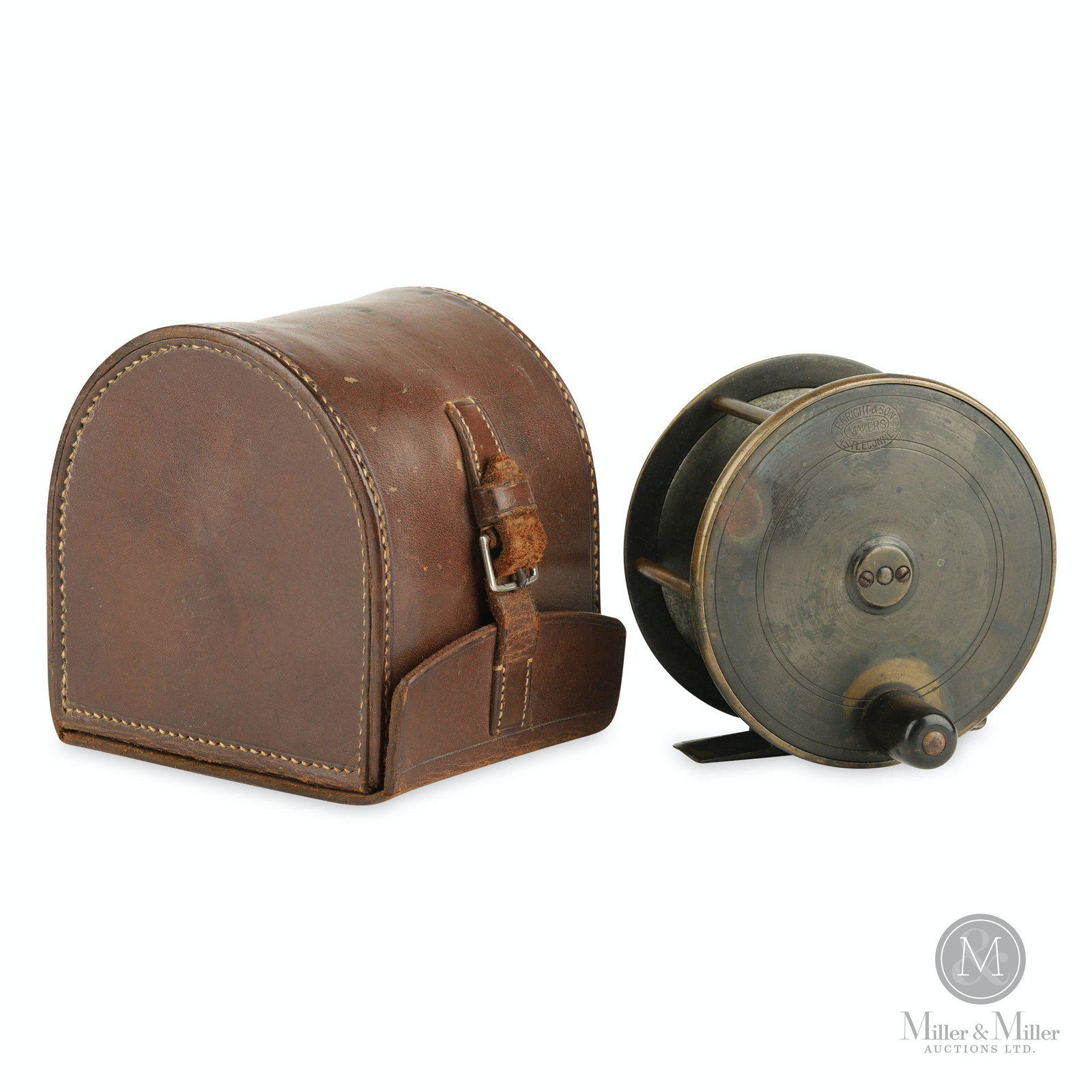Enright & Son, Cased Irish Brass Reel: English. Stamped, "Enright & Son Makers Castleconnell". Block leather case stamped, "Bernard & Son" inner cover. 4 1/4" diameter. Mechanically functioning. Marty Osler collection.