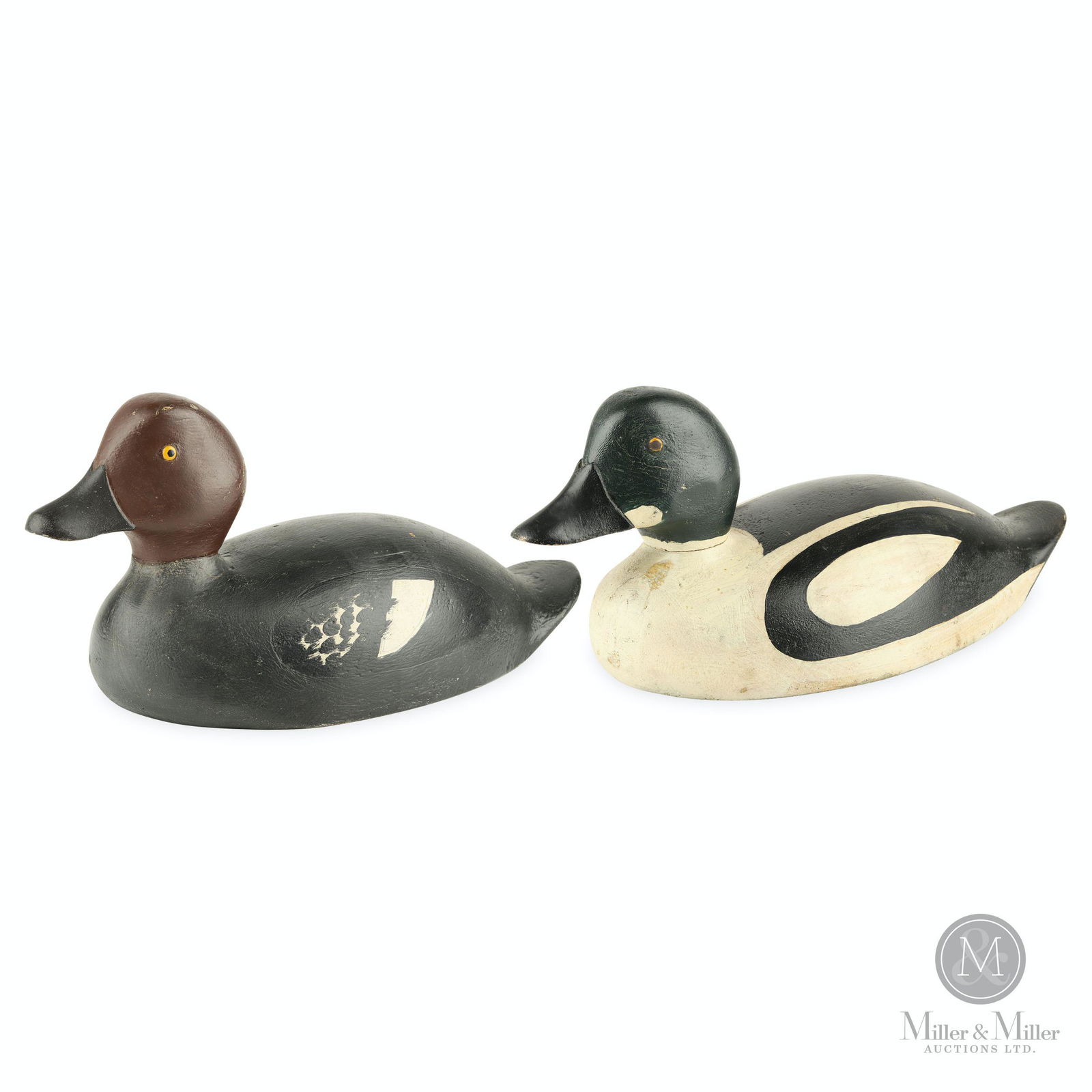 Ferman Eyre (1882-1969, Brockville, ON). Pair Goldeneye: Canadian. These 2 decoys are all original and in excellent condition. Very light gunning wear with a few paint rubs including on the head of the Hen. Ferman was a house painter and boat builder, both