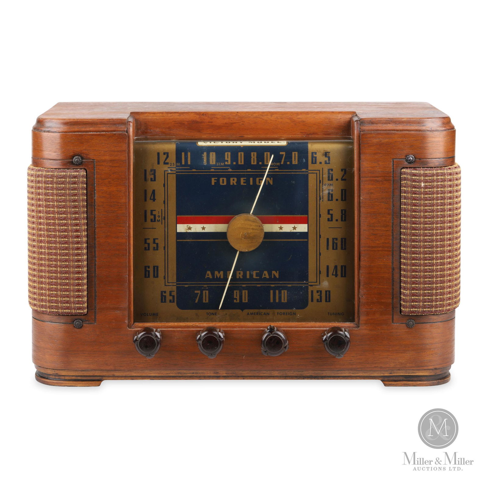 Crosley Model 63TJ "Victory" Radio: American. 1940s. Wood veneer case. Retains original decal pasted to underside of case. 10" H x 15.5" W x 9" W.