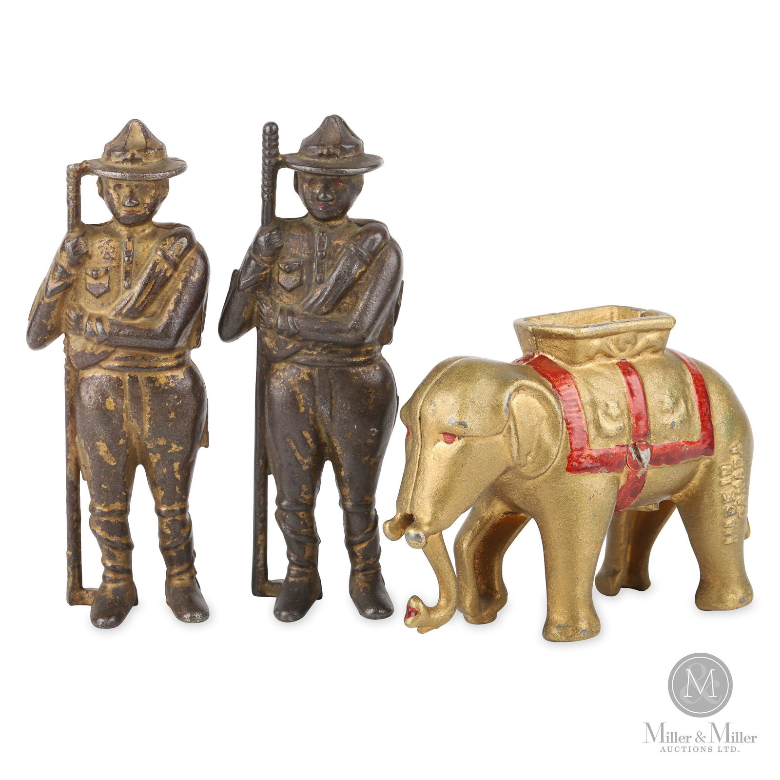Canadian Cast Iron Mechanical and Still Banks: A rare and hard to find collection of Canadian Banks. Collection includes two Boy Scouts and an Elephant with Howdah. A lot of Canadian castings were adapted from American or English molds. From the T
