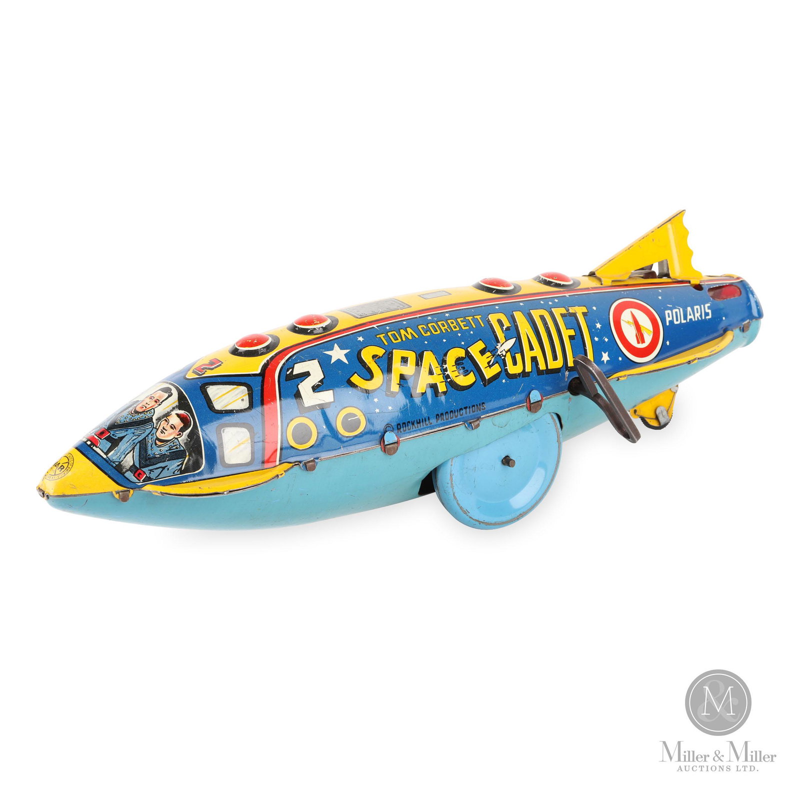 Marx, Tom Corbett Polaris Rocket: Lithographed tinplate. Marked "ROCKHILL Productions POLARIS". Mechanically functioning. Exhibits some light scratches in areas along the sides and slight paint loss primarily on the high points and wh