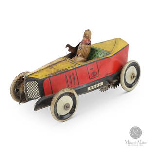 Greppert & Kelch, 543 Racecar: Wind up toy. From the Tanenbaum Collection. Lithographed tin. Marked "Greppert & Kelch". In working order. Paint crazing and light soiling is evident over much of the surface. The seam at the rear of