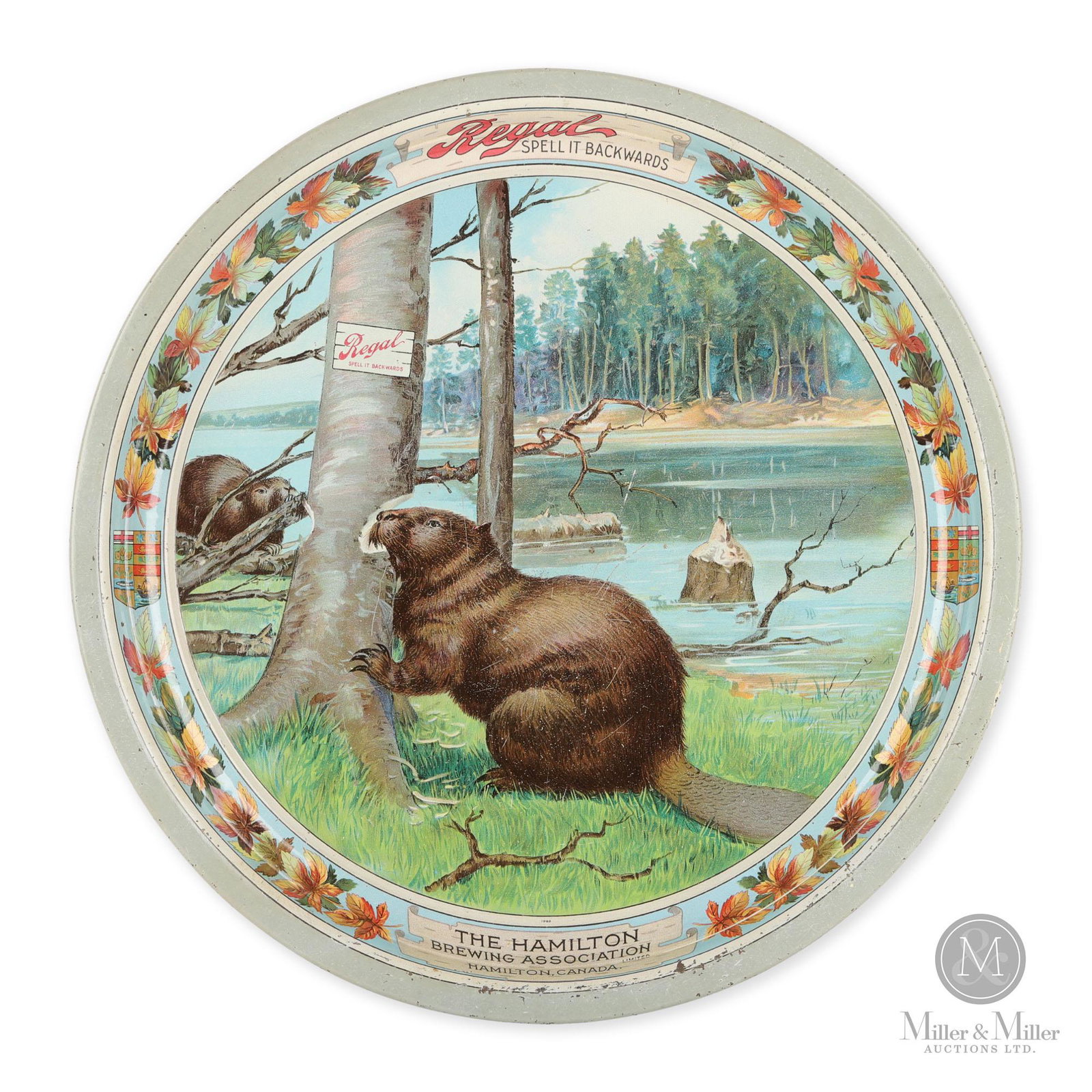 Regal Brewery, Hamilton Beaver Tray: Among Canada's most sought after beer trays. Features an outdoor scene with two beavers constructing a dam at the riverside. The image is surrounded by a border of maple leaves and the slogan "Regal -