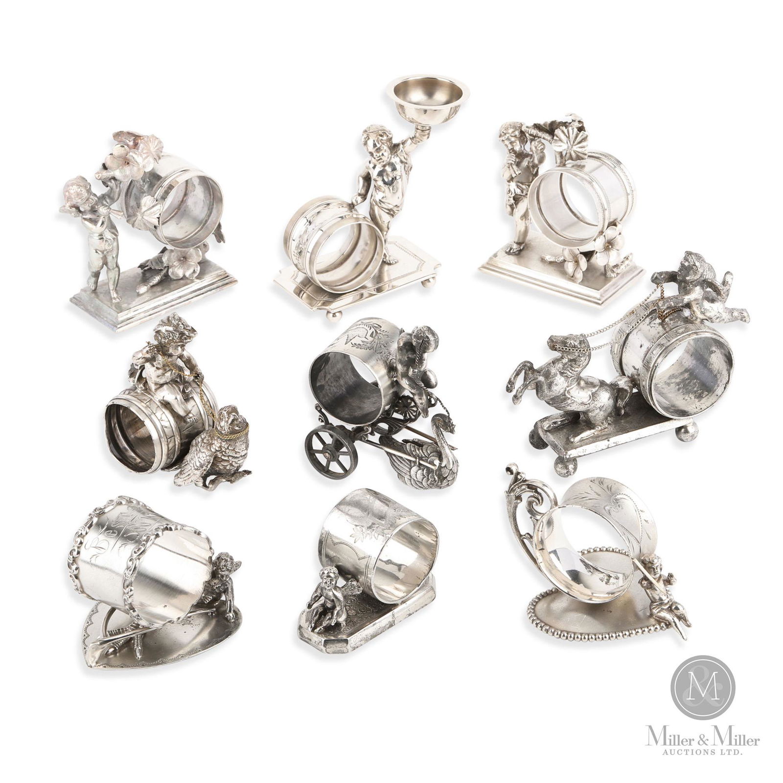 Silverplate Cupid Figural Napkin Rings (1 of 12)