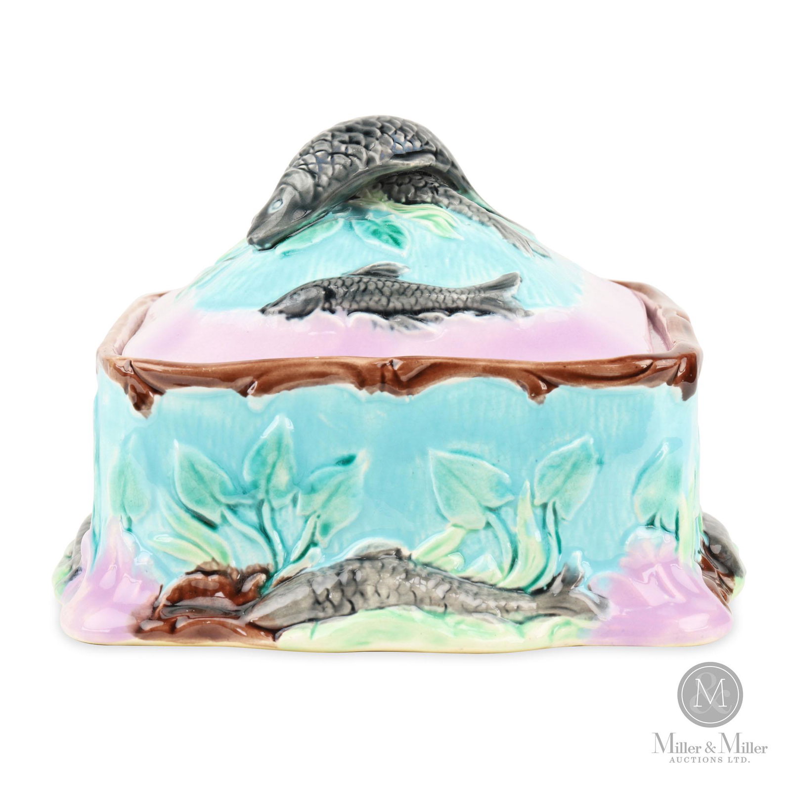 Majolica Figural Sardine Box: Rectangular majolica pottery sardine box and cover with double fish finial. From the Robert Bolus Estate. Edge of cover with a faint 1" hairline. Pottery. English. Nineteenth century. 4.5" H x 6" W x 