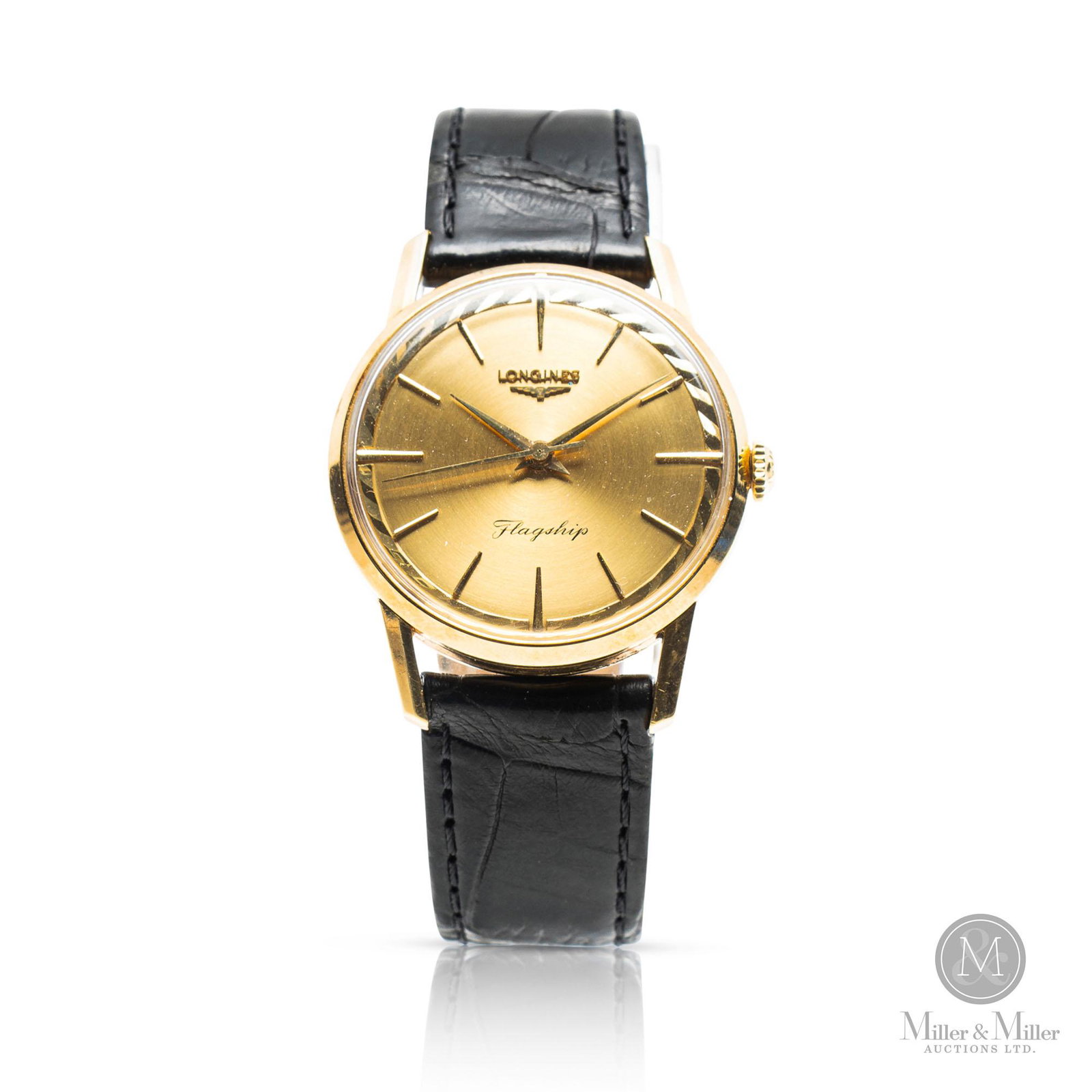 Longines, 18K Flagship: Swiss. 34mm case diameter. Features a embossed image of a full-masted ship on the caseback and a fluted rehaut. Stamped for 18K gold inner caseback and inside lugs. 18K gold. Genuine crocodile strap. 