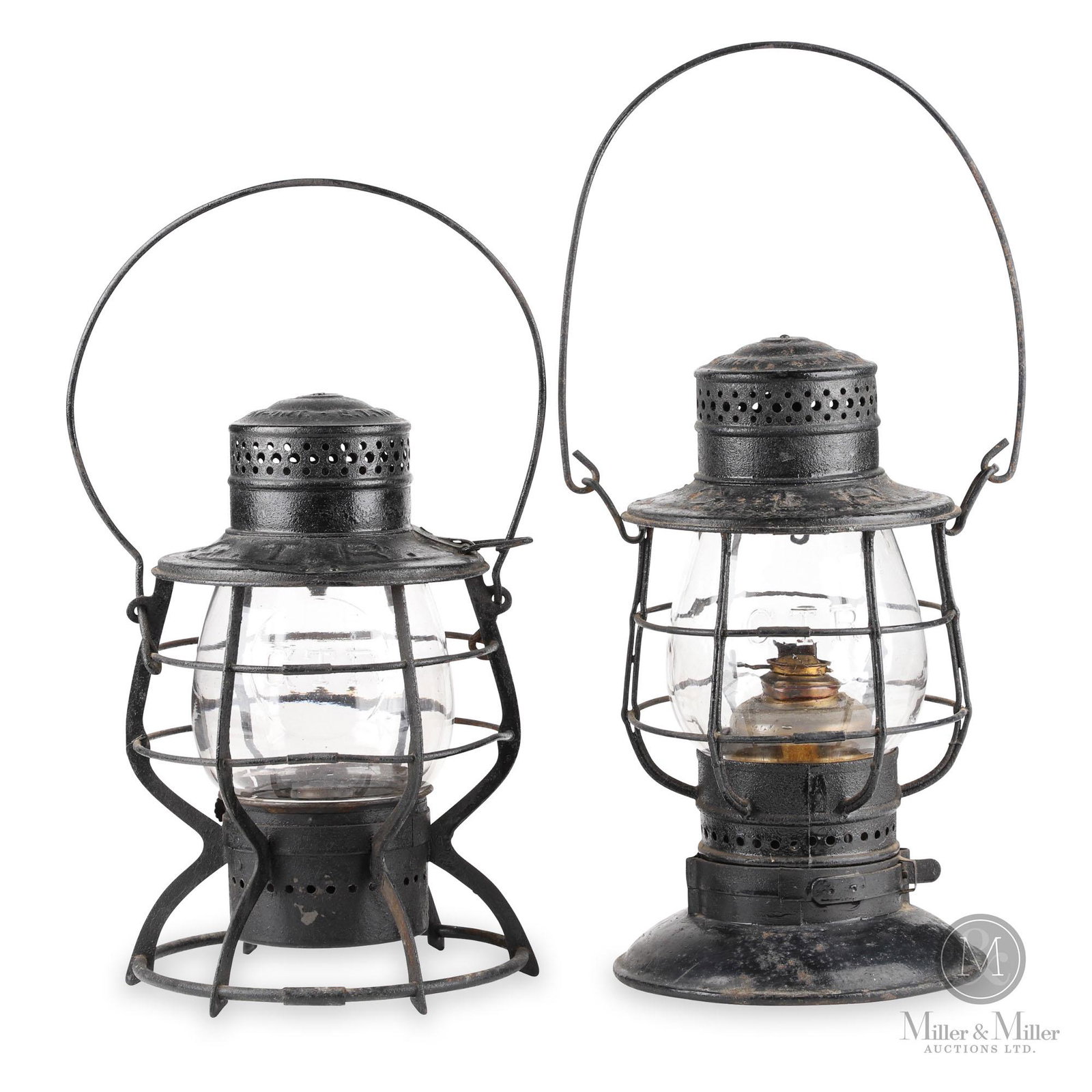 Grand Trunk Railway Signal Lanterns: Canadian. 1920s. Painted steel. Each stamped, "E.T. Wright & Co. Mfrs. Hamilton, Ont - G.T.R". Globes embossed, "GTR". Each in older working paint with light surface oxidation. Solid base example exhi