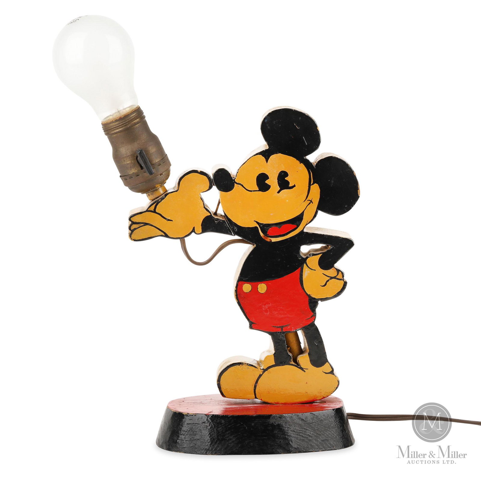Mickey Mouse Desk Lamp: Canadian. 1950s. Painted hardwood. Made by Joe Byway Sr. of Thamesford, Ontario as an art project. Exhibits minor toning. From the Joe Byway Collection. 10 x 7 x 4.25".