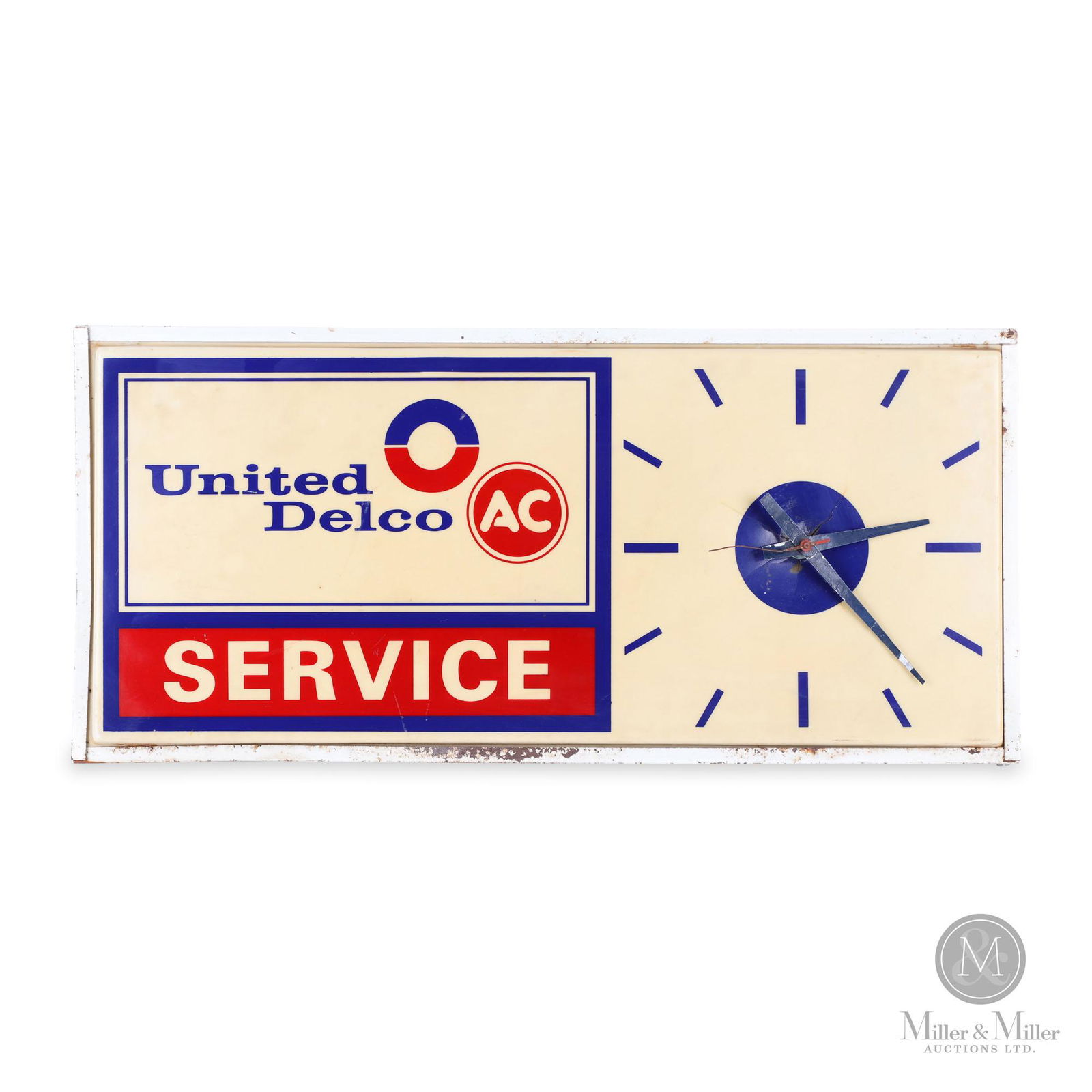 AC United Delco GM Dealer Clock: Canadian. 1970s. Lighted acrylic panel with integral clock. Tagged, "Summus Communications Limited, Toronto, Montreal" rear case. Exhibits a series of cracks that extend outward from the clock hands'