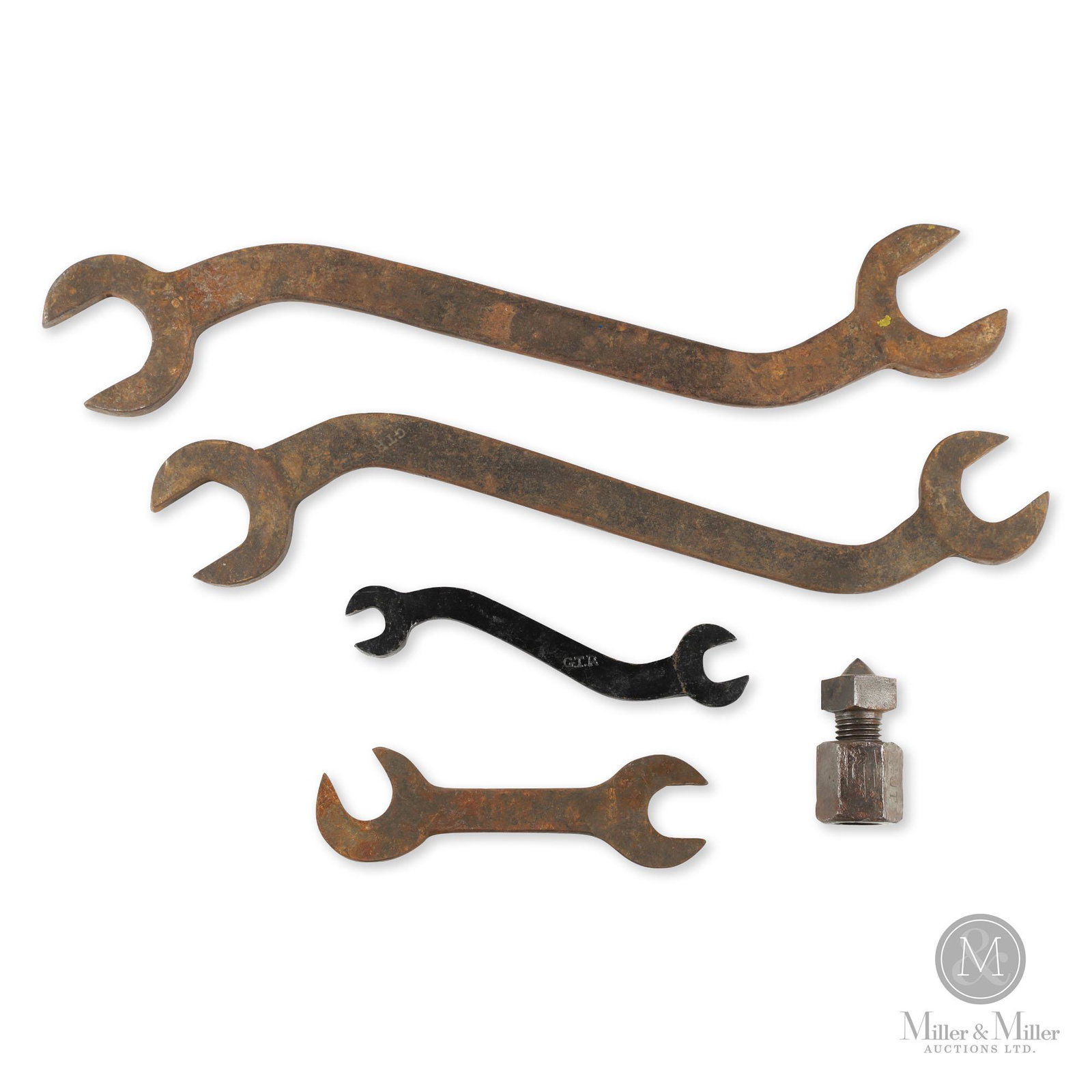 Grand Trunk Railway Wrenches & Stud Nut: Canadian. 1910s. Forged steel. Each tool stamped, "G.T.R". Includes four wrenches and a stud nut. Each exhibit light to moderate surface oxidation. From the Joe Byway Collection. Wrenches 10 to 25.5"