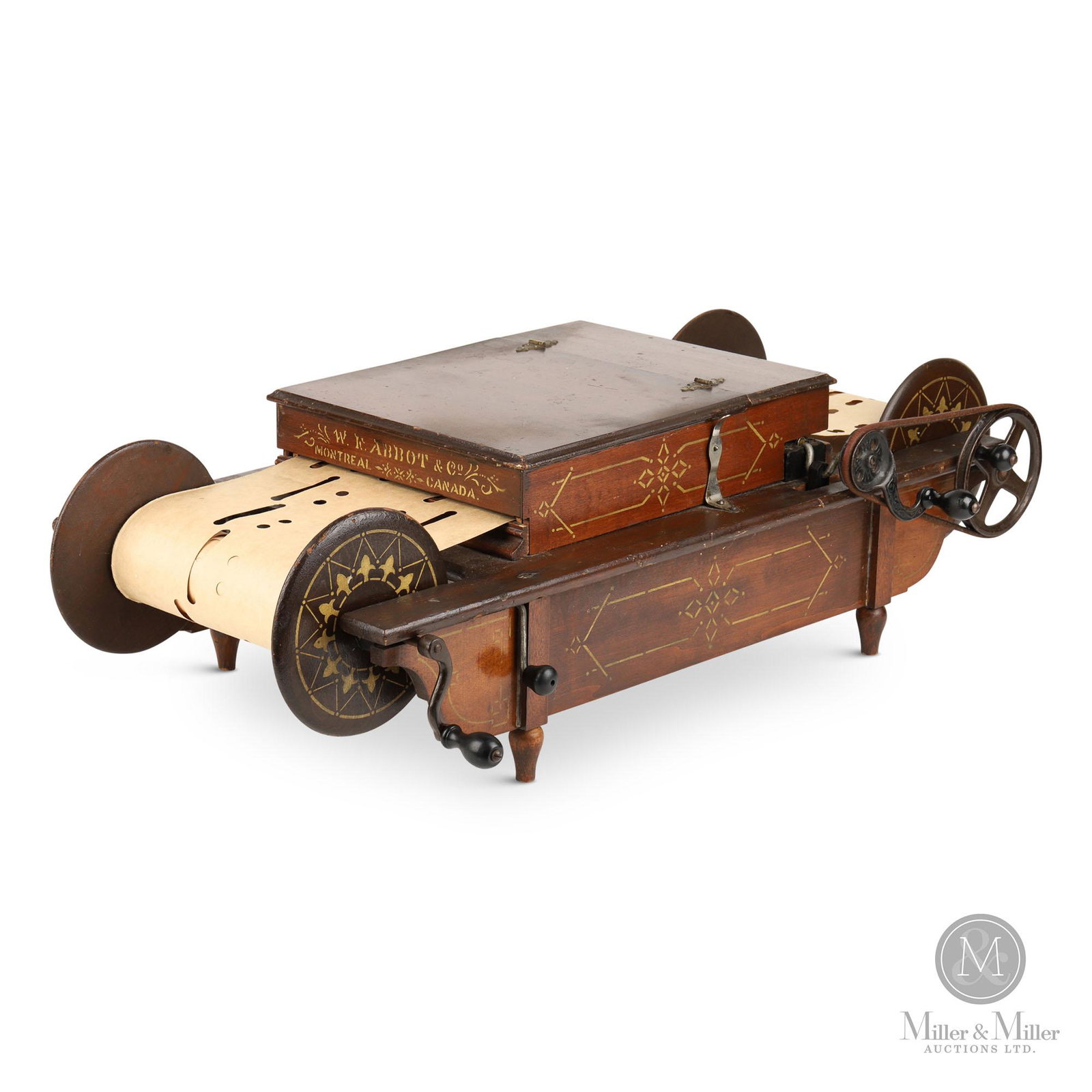 Mechanical Orguinette Paper Roll Organ: Canadian. c1880. In good cosmetic condition. Music plays when handle is turned. Attractive tabletop paper roll organ, or "orguinette" as it was called by its maker, W F Abbott of Montreal. Pat'd 1878/