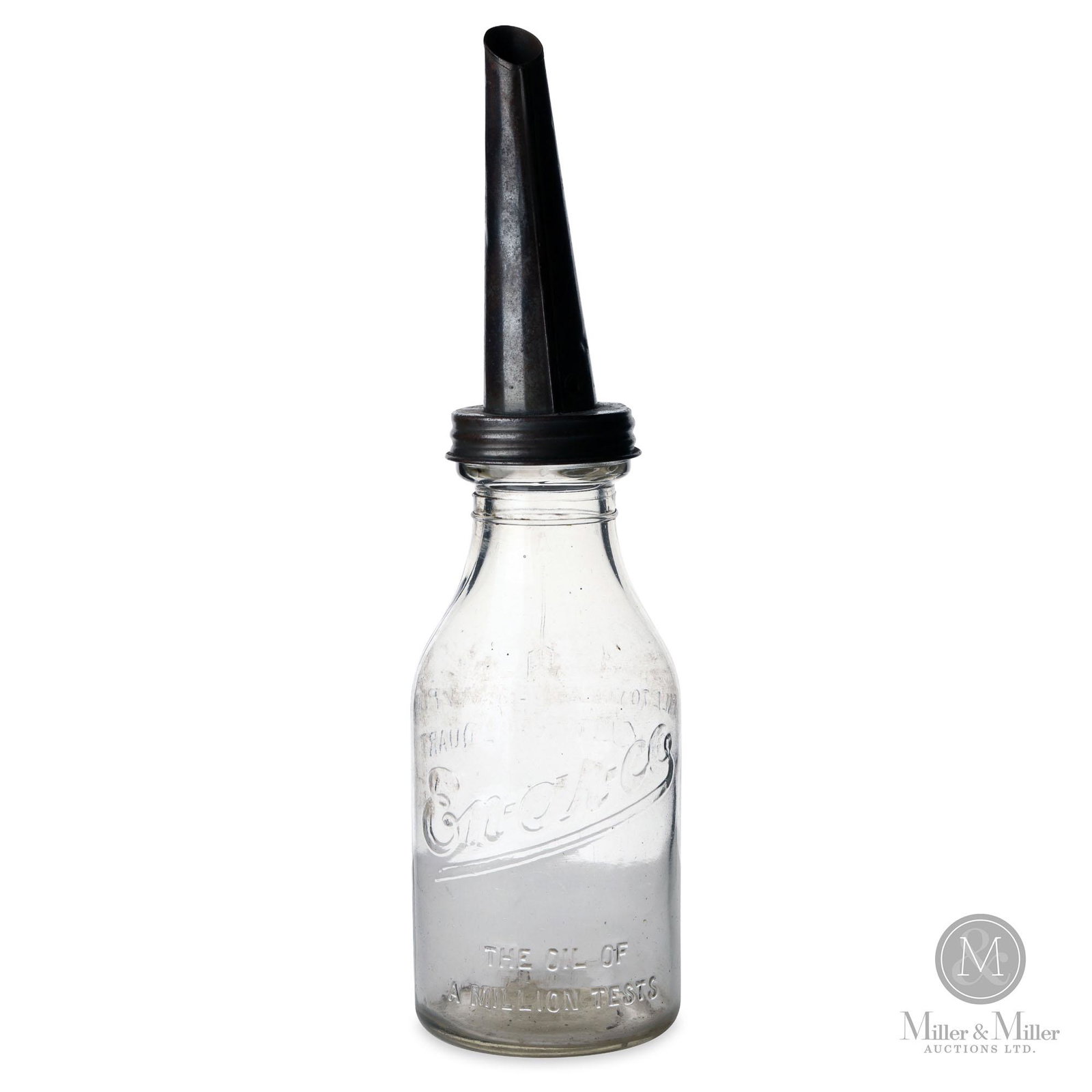 Enarco Motor Oil Quart Bottle: Canadian. 1930s. Embossed glass. Minor surface scratches. Spout marked, "ECO Service Station Equipment Ltd. Toronto, Canada". Bottle marked for Dominion Glass on the underside. Horseless Carriage Muse