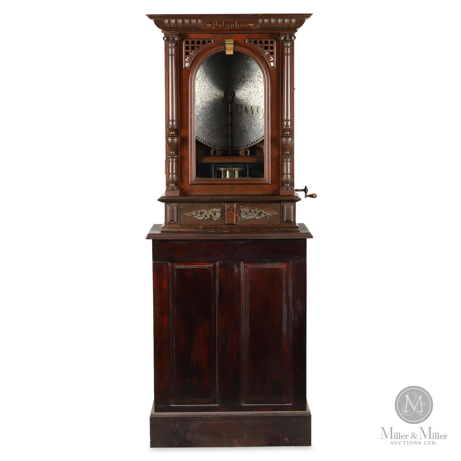 Polyphon No. 104 Coin-Op Disc Music Box: Swiss. c1895. Polyphon's Style No. 104 was the company's most popular model used in British taverns. This large upright coin-op music box, with coin slots on each side, plays 19 5/8" discs upon the in