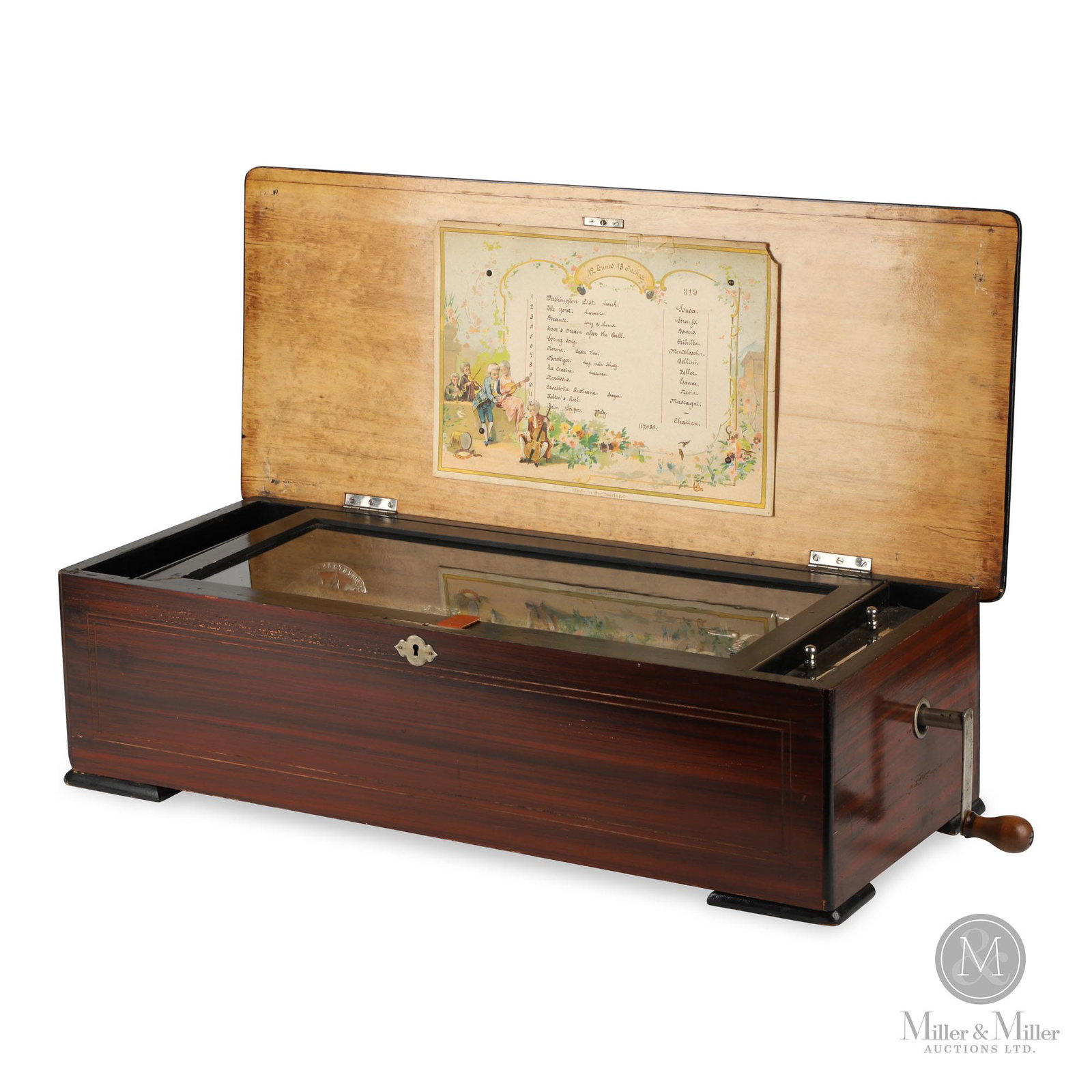Swiss 12-Tune Cylinder Music Box: Swiss. 1890s. In good cosmetic condition. A late-style cylinder box with zither attachment designed to produce a banjo-like emphasis to the sound. There is an inscription on the movement; "USA Patent,