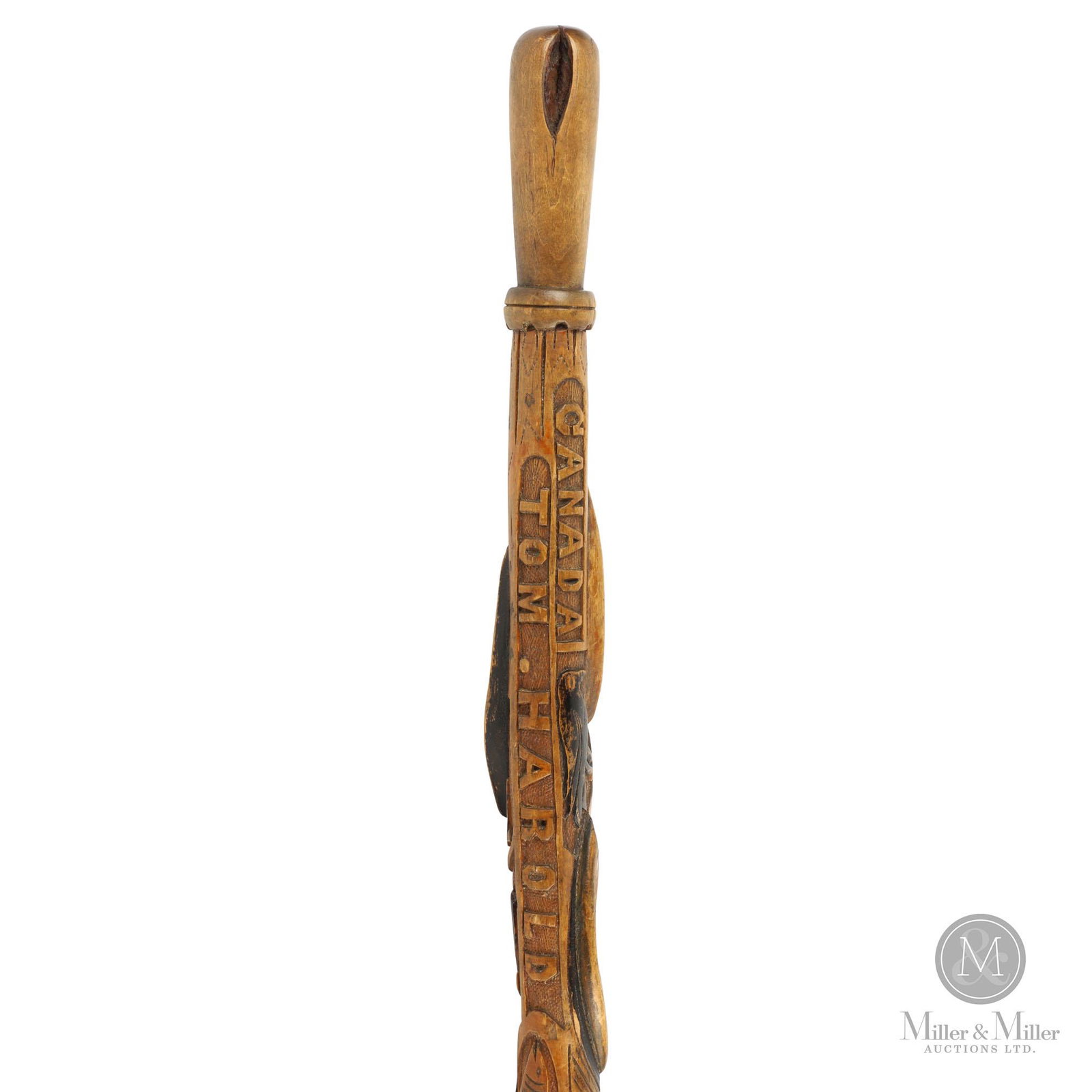 1907 Carved Walking Stick by Michael Orion: North American. Dated 1907. Maple, stained and painted. Carved by Michael Orion. An exceptionally well-carved cane with the various first names "Tom, Harold, Mich, Mike" and the words "Canada" and "Or