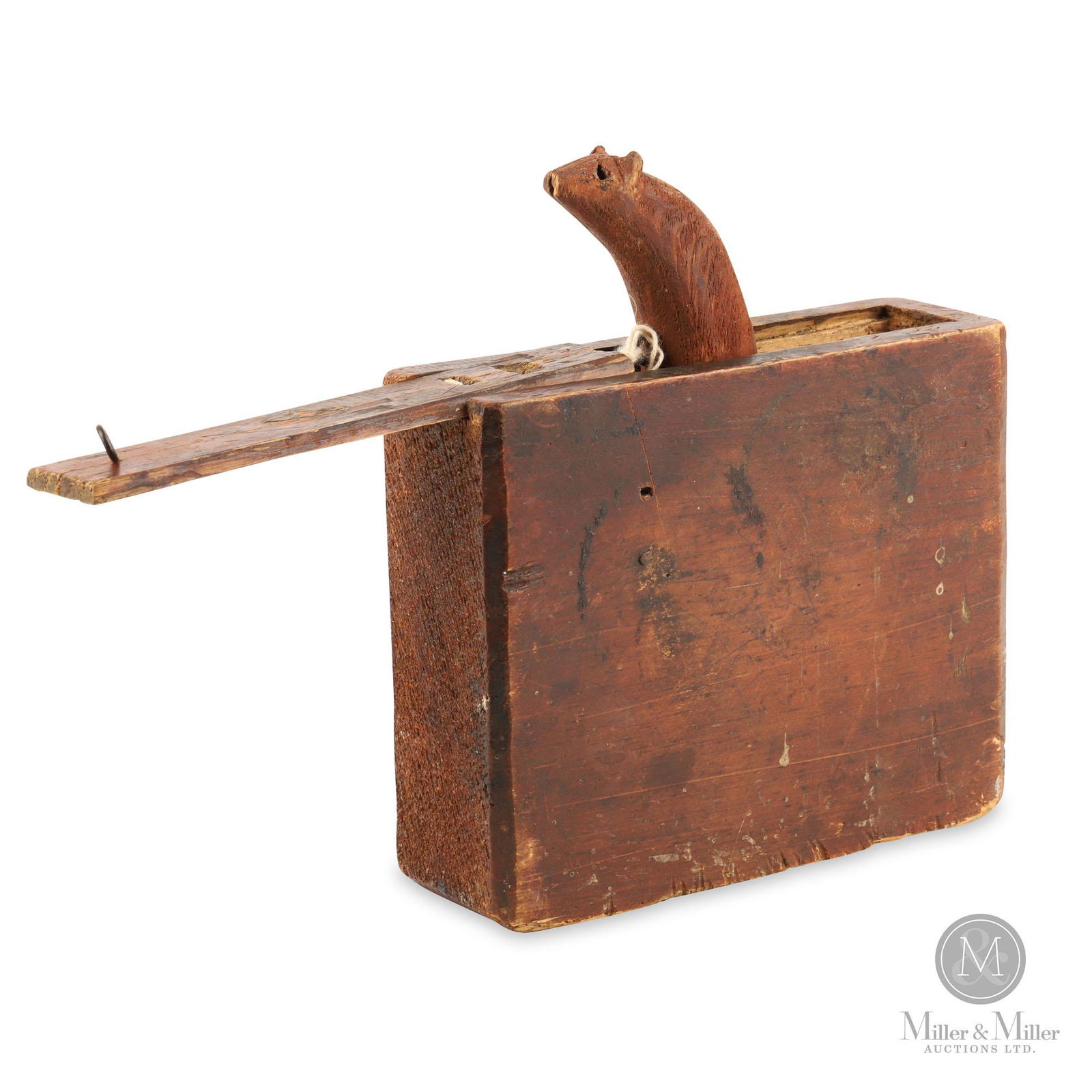 Folk Carved "Surprise" Box: North American. Dated 1898. Pine, painted trick box carving. Carved from a single pine block. When the slide lid is pulled a bear pops out. All in original red paint. Illegible writing to one end. Goo