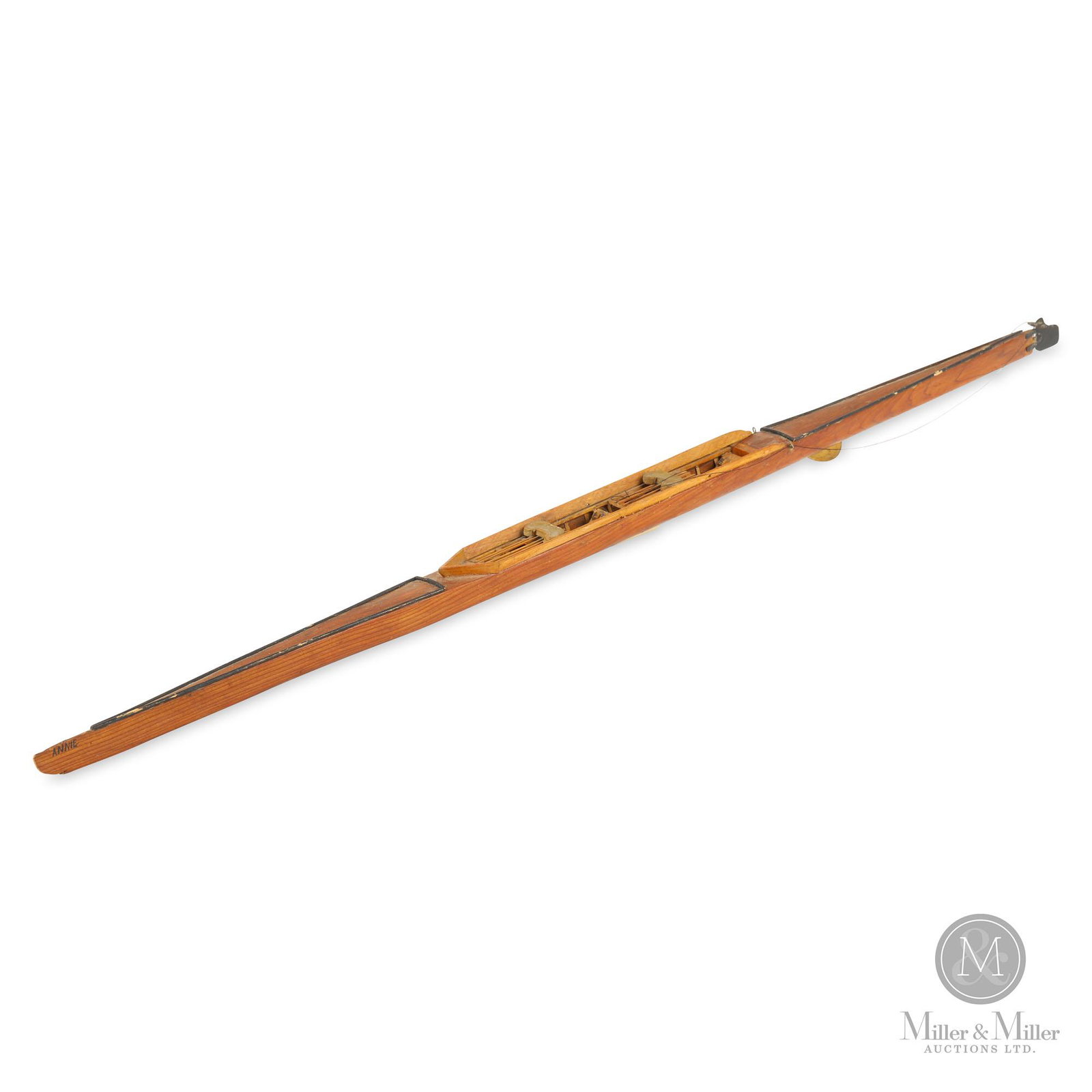 A Model of a Rowing Scull attributed to Phelps: English. Early 20th C. A well-executed model of a racing scull attributed to William Phelps of the renown boat making family in London, England. 25.5(L) x 1(H) x 1(W) From the Marty Osler Collection. 