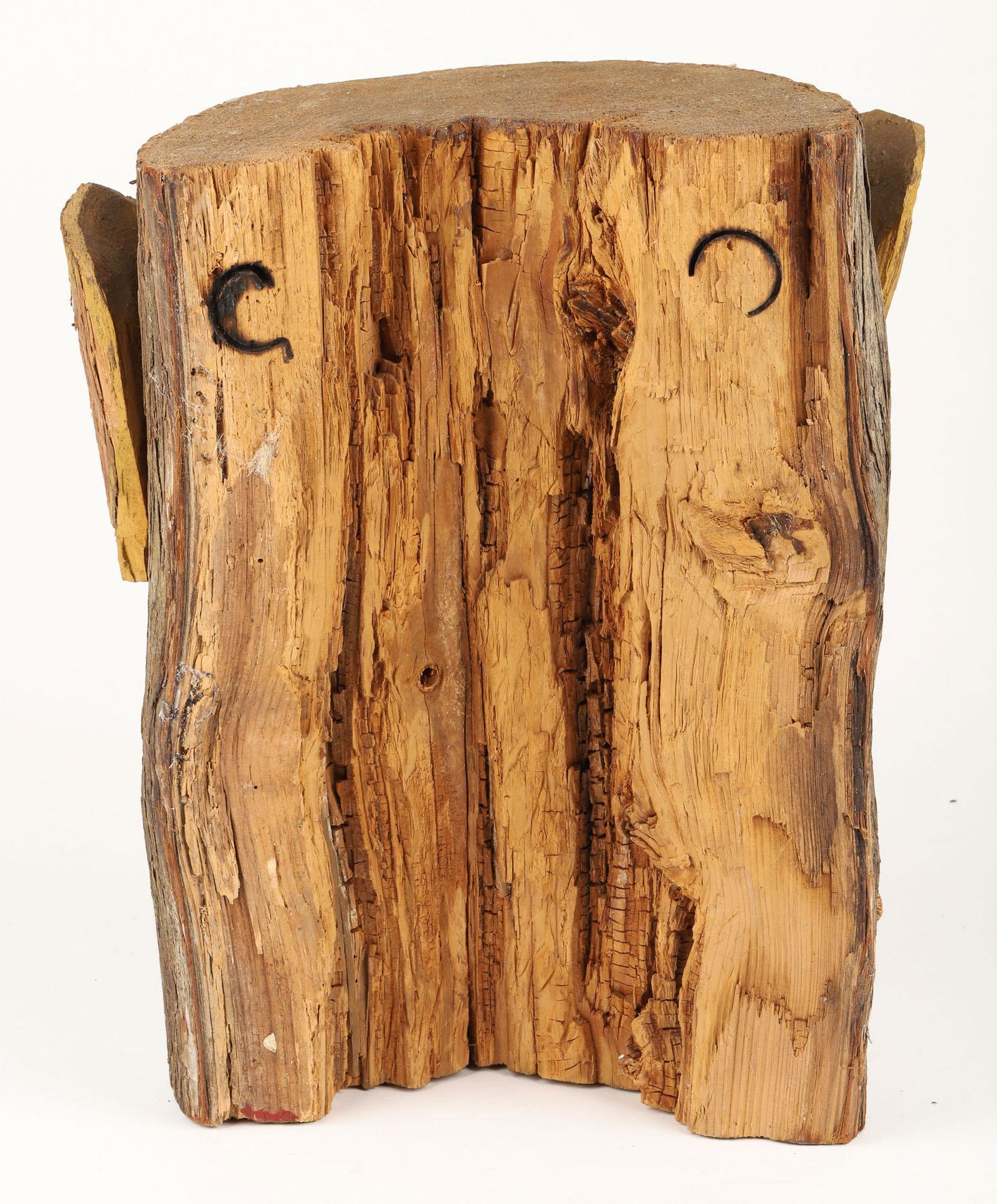 Cigar-Smoking Log Head by George Cockayne
