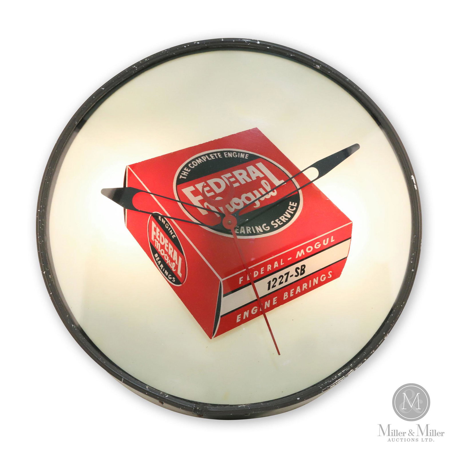 Federal Mogul Engine Bearings Clock: American. 1940s. Reverse baked glass dial. Requires outer hour marker dial chapter which may have been originally applied to the outside of the dial. Also requires rear access door. Gary Archer Collec