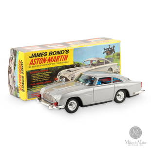 Gilbert James Bond Aston Martin DB5: Japanese. 1965. Box marked, "Copyright 1965 Glidrose Productions, Ltd. & Eon Productions, Ltd. Copyright 1965 A.C. Gilbert Co. - Made in Japan". Toy marked, "James Bond 007 Aston Martin DB5 - Gilbert"