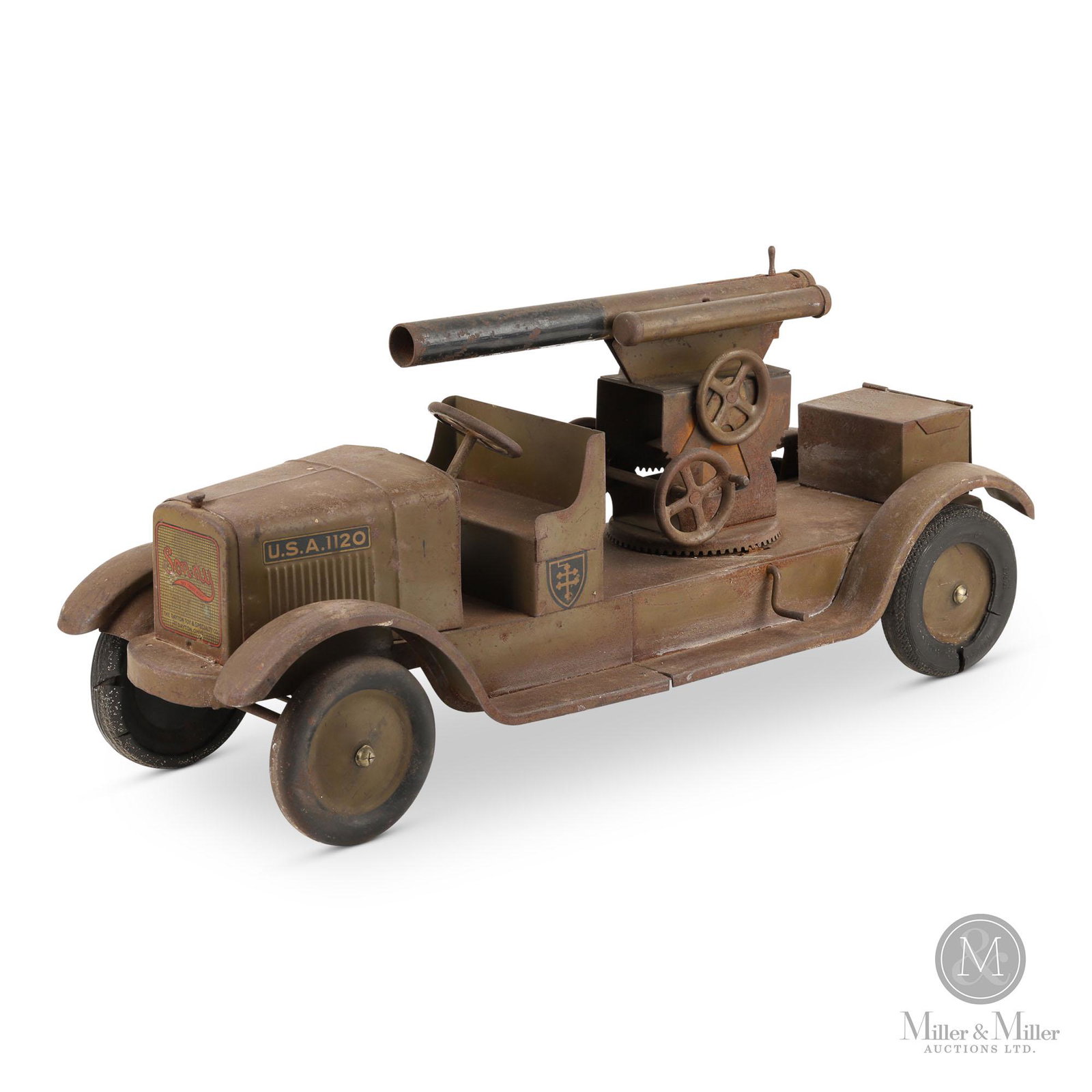 Dayton Toys Anti-Aircraft Truck: American. 1940s. Pressed steel with decals. Marked, "The Dayton Toy & Specialty Co., Dayton, Ohio" lower grille. Original paint and decals. Requires front driver-side tire. The remaining tires exhibit