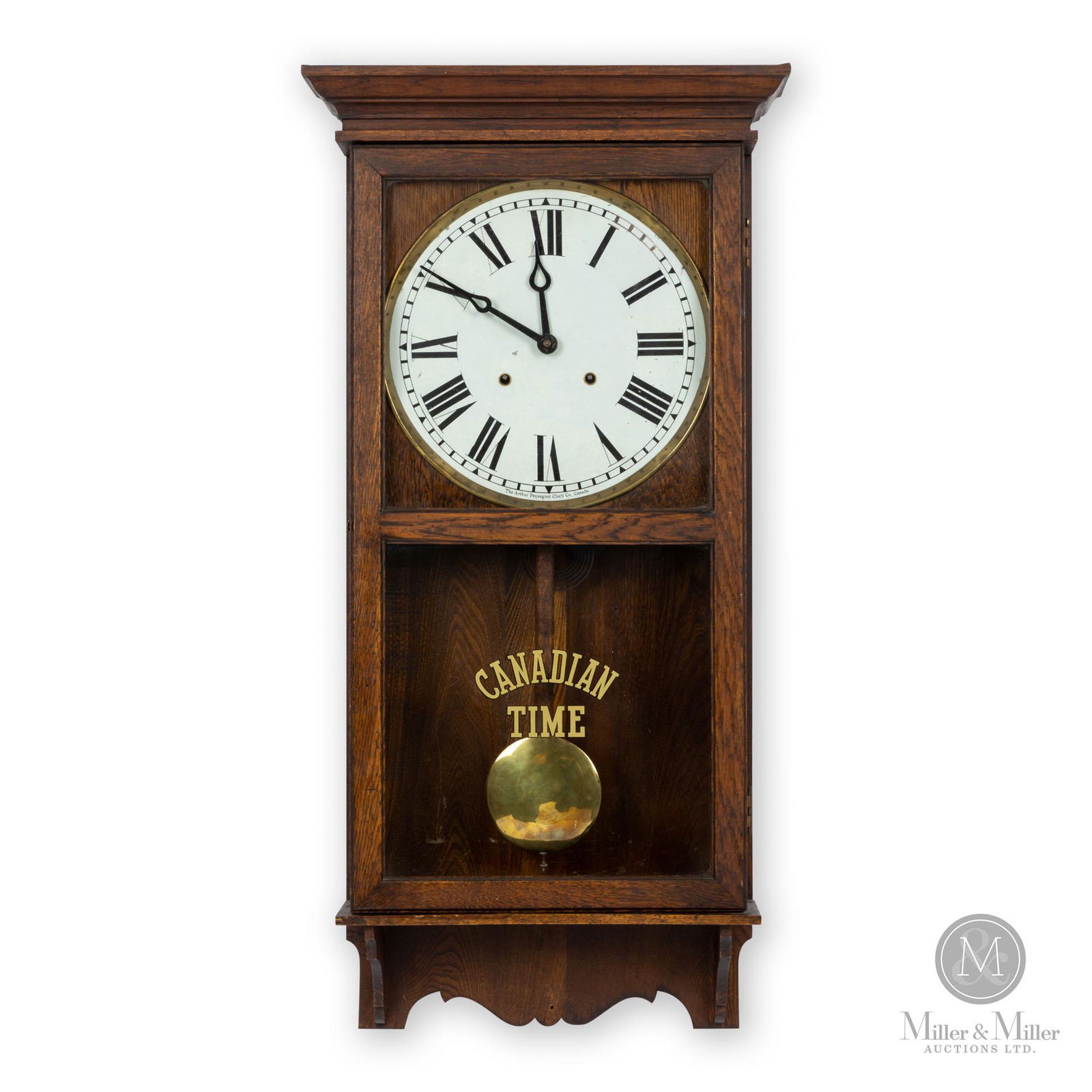 Pequegnat Canadian Time Office Wall Clock: Canadian. 1920s. Dark oak. 8-day spring driven time and strike movement. Paper on reverse. Dial marked, "The Arthur Pequegnat Clock Co., Canada" lower edge. Original finish. Minor hole in the lower ed