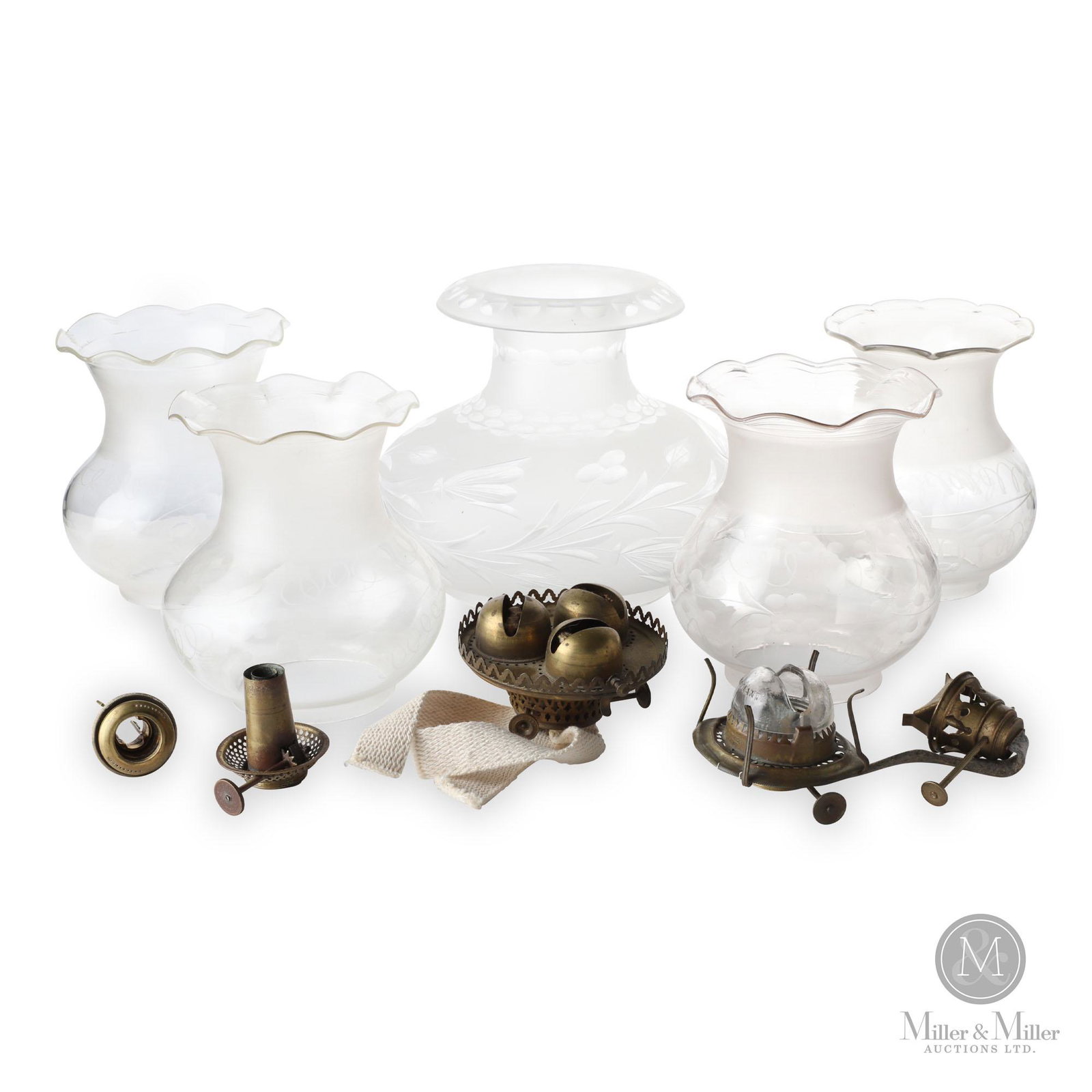 Assorted Shades, Burners, & Filler: Ten (10). 1850-1890. Brass, glass. An assortment of shades, frosted and engraved. Four burners and one filler. From the Valerie Lister Collection. Shade: 7.5"H. Other shades all 6.5"H.