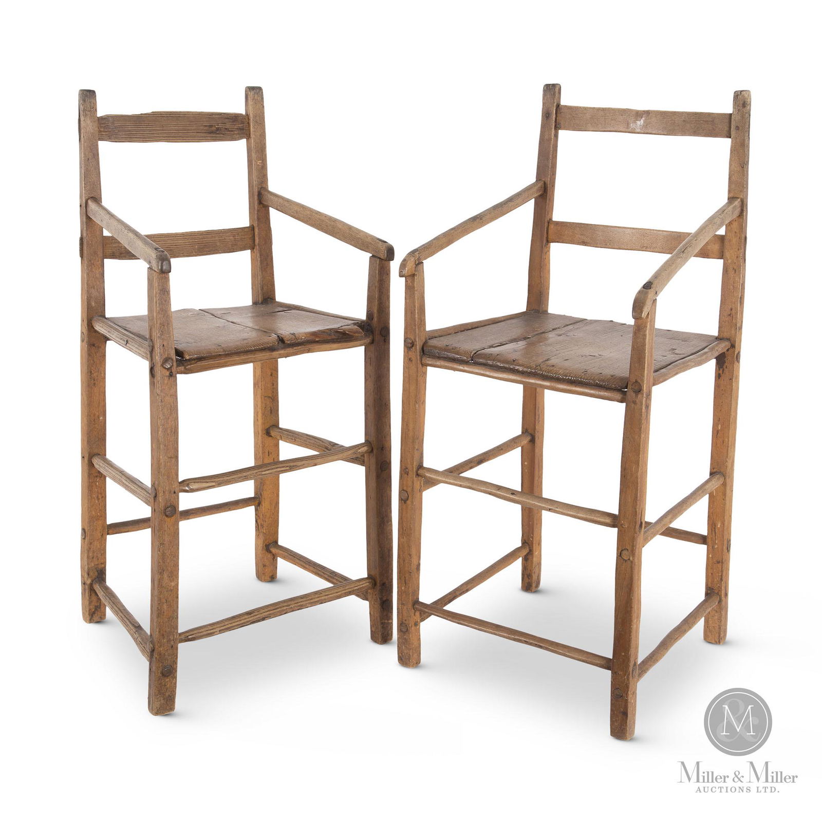 Loretteville High Chairs / Chaises Hautes: Two early high chairs with slat backs and plank seats, made by the same maker and from the same family. One chair with its curled hand grips and pegged slats is likely slightly older than the other. R