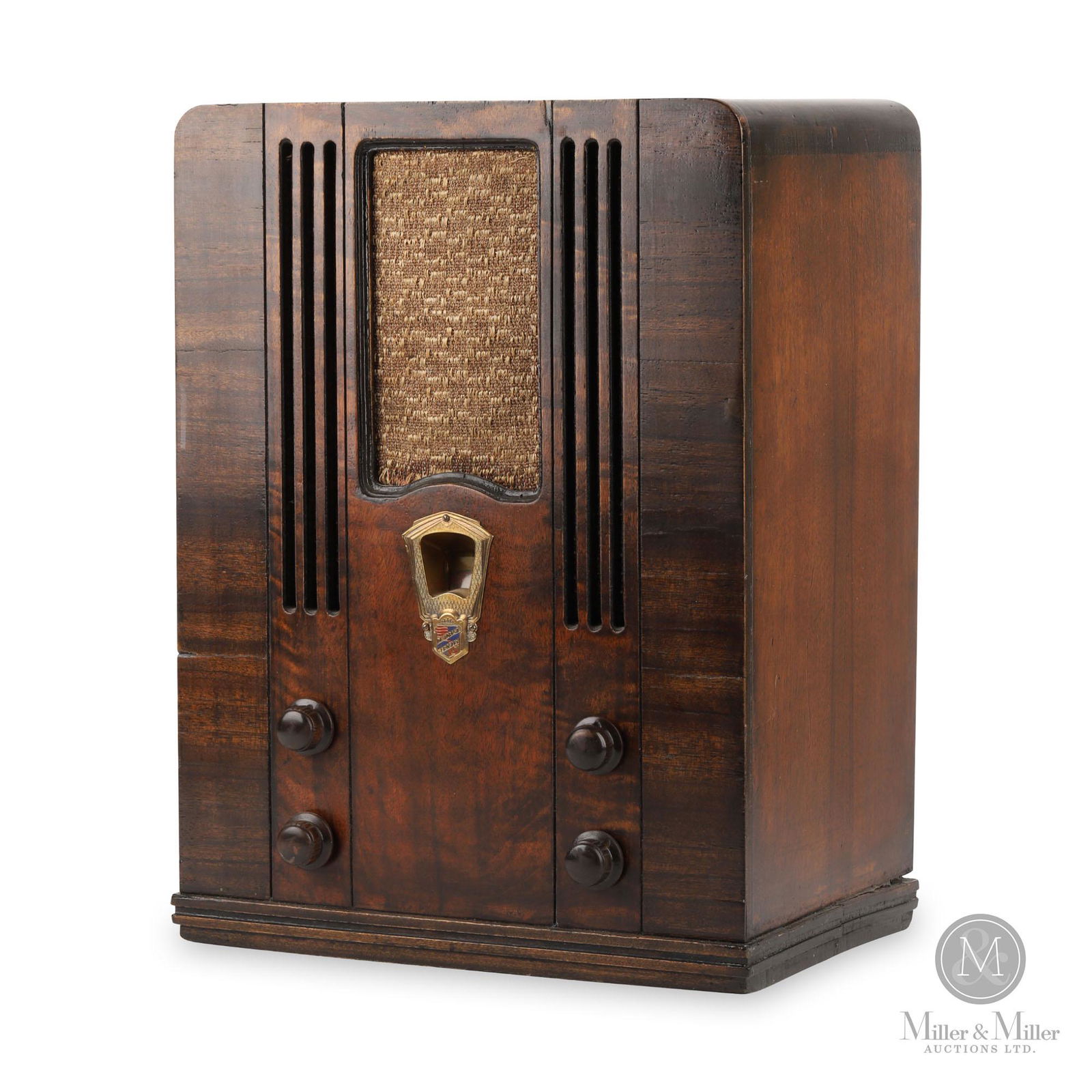 Deforest-Crosley Model 1260 Radio: Canadian. 1934. Label on bottom reads, "Model No. 1260, Mitchel Manufacturing Co. Toronto. Serial No. LT 1392". Radio has been refinished, possible replacement knobs. Tested working condition. Marked