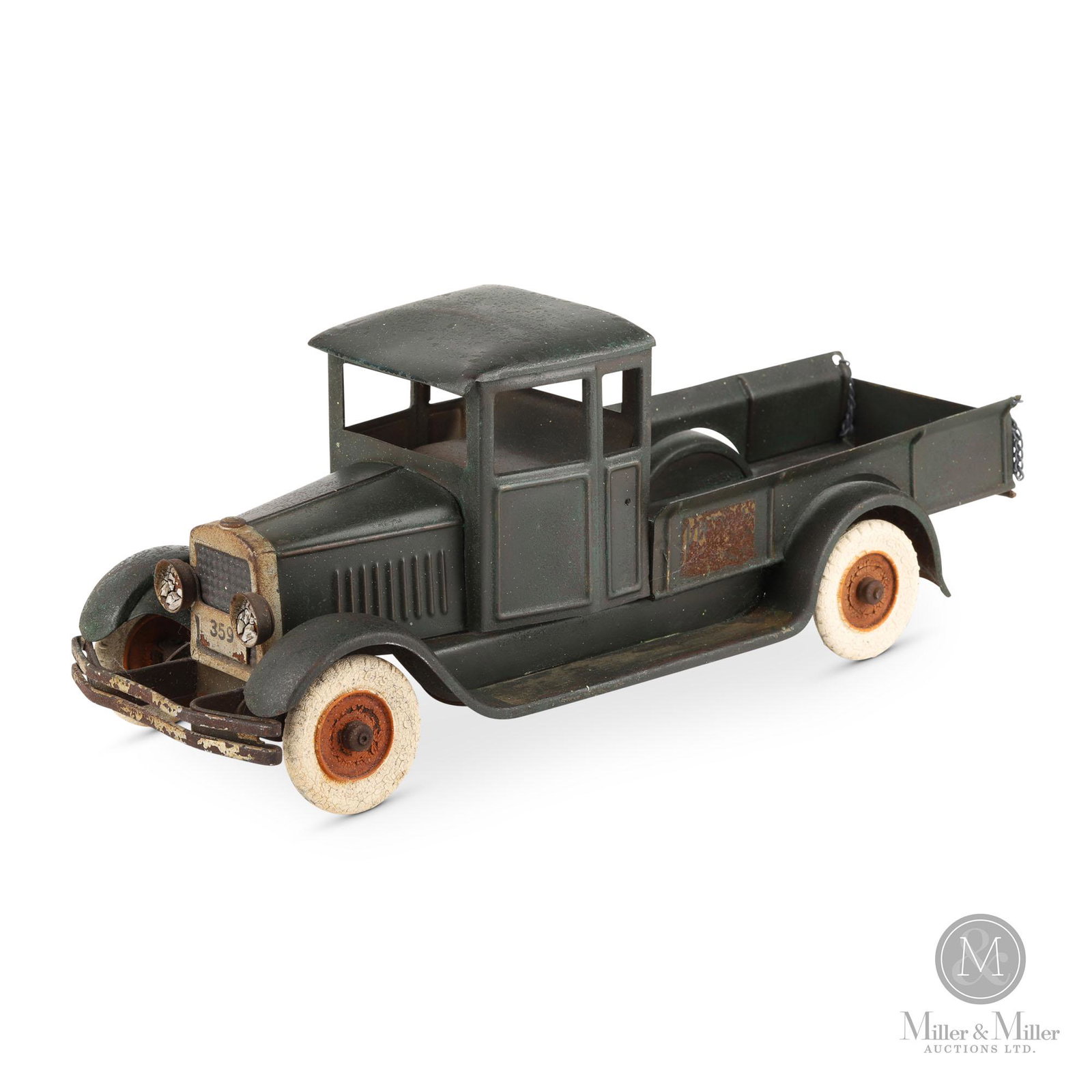 Kingsbury Windup Pickup Truck: American. 1930s. Pressed steel. Tailgate with chains. Marked, "Kingsbury" and "359" on front. Worn with original hardened white tires. Condition: 5/10. 5.5"H x 14.5"L x 5"W.