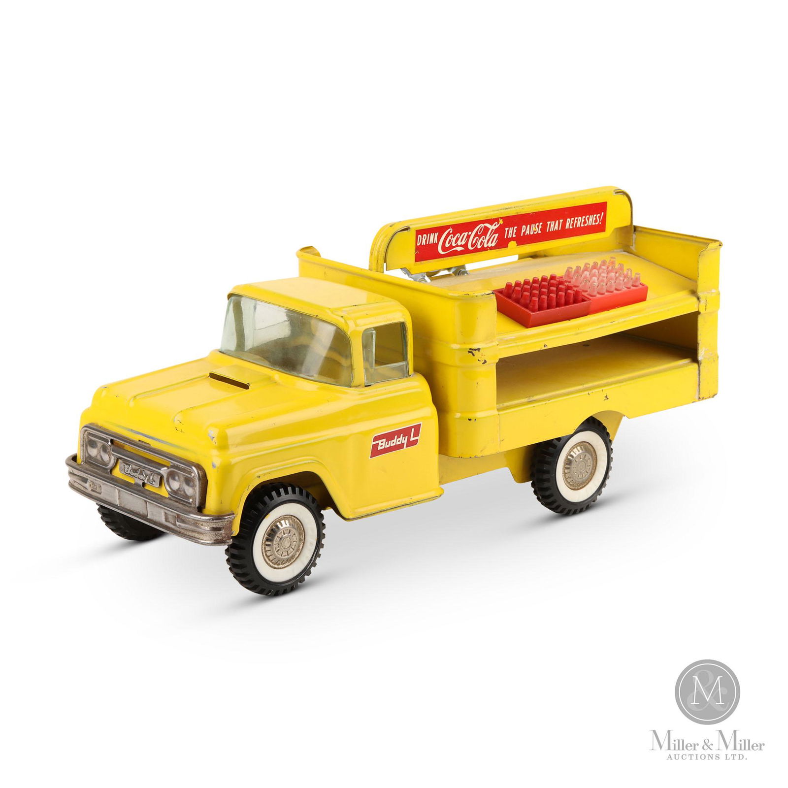 Buddy "L" Coca-Cola Delivery Truck: American. 1960. Pressed steel. Delivery truck with 1 metal case trolley and 5 plastic bottle cases. Stamped, "Buddy "L" on grille and tires. 7"H x 15"L x 6"W. From the Linden and Adeline Johnson colle
