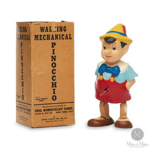 Disney George Borgfeldt Corp Walking Pinocchio: American. 1939. Hand painted composition. Rare piece with hard to find original box. Manufactured exclusively for the George Borgfeldt Corp. George Borgfeldt was the first distributor licensed to sell