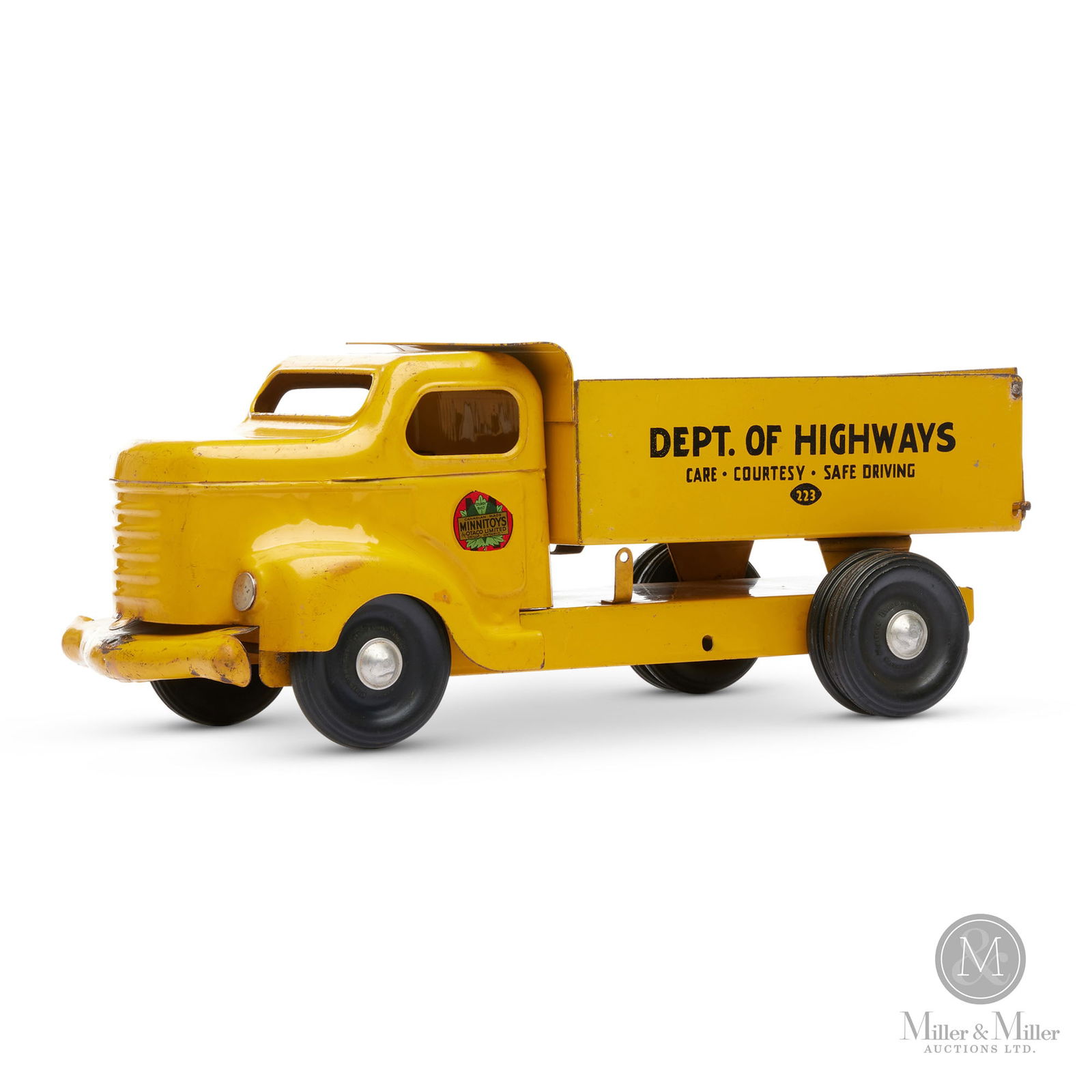 Otaco, Minnitoy Dept. of Highways #223 Dump Truck: Canadian. 1940s. Pressed steel. Manufactured in Orillia, Ontario by Otaco (Orillia Tudhope Anderson Company). Minnitoys were created primarily for the post-war 'baby boom' market. Marked on doors of c
