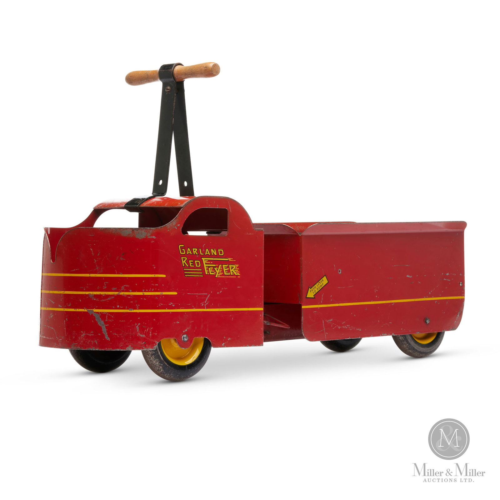 Garland Toys Red Flyer Ride-On Dump Truck: American. 1940s. Pressed Steel. Little known about the company. Marked on side. 8.5" x 24" x 8.5" (taller with handle). The Howie Meyer Legacy Collection.