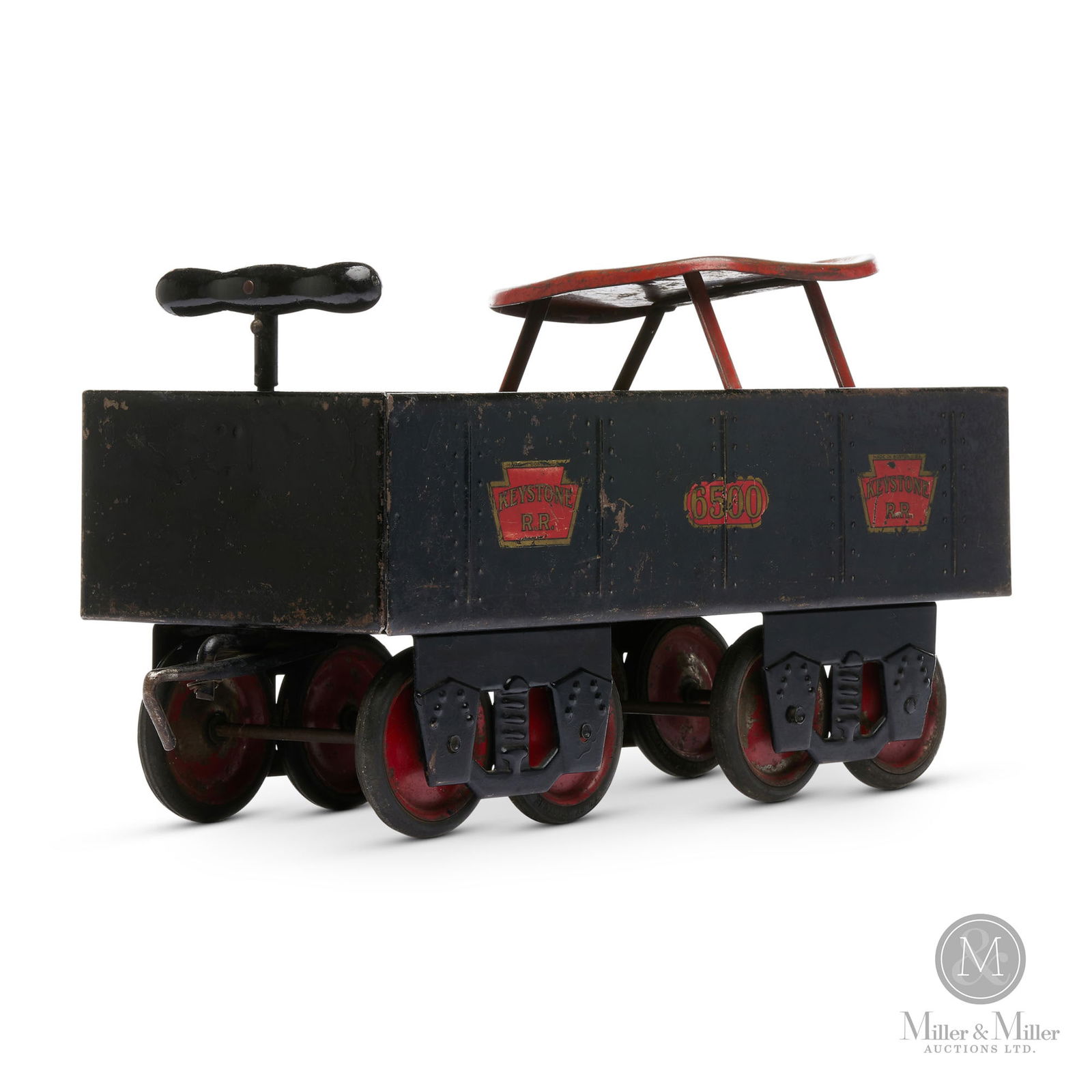 Keystone 6500 Ride 'Em 4-4 Coal Tender: American. 1930s. Pressed steel. Made by the Keystone Mfg. Co., Boston. The company trademarked the phrase "RIDE 'EM" in 1932. Marked on the side. 9.5" x 20" x 7.5". The Howie Meyer Legacy Collection.