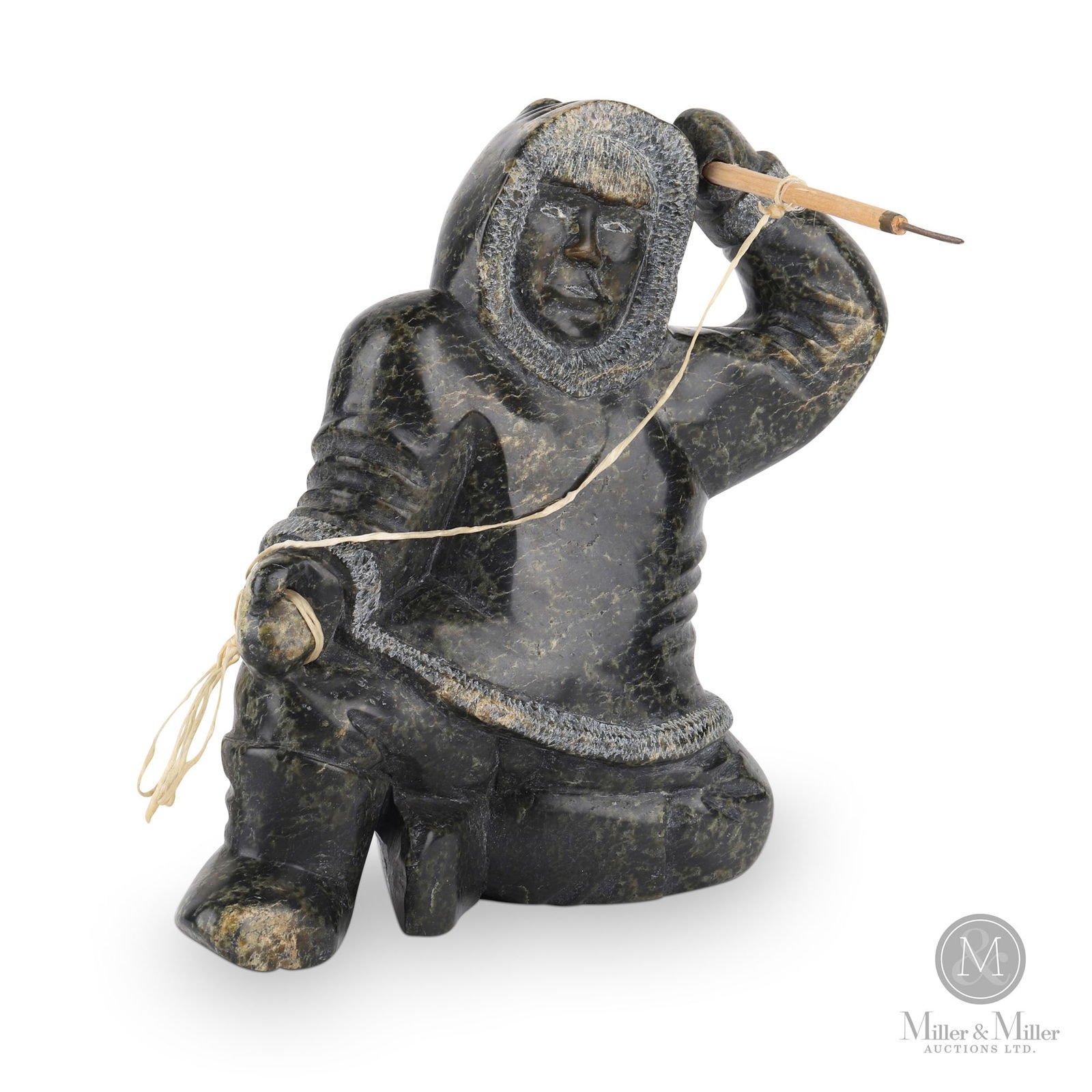 Inuit hunter poised with spear -- 1960 (1 of 6)