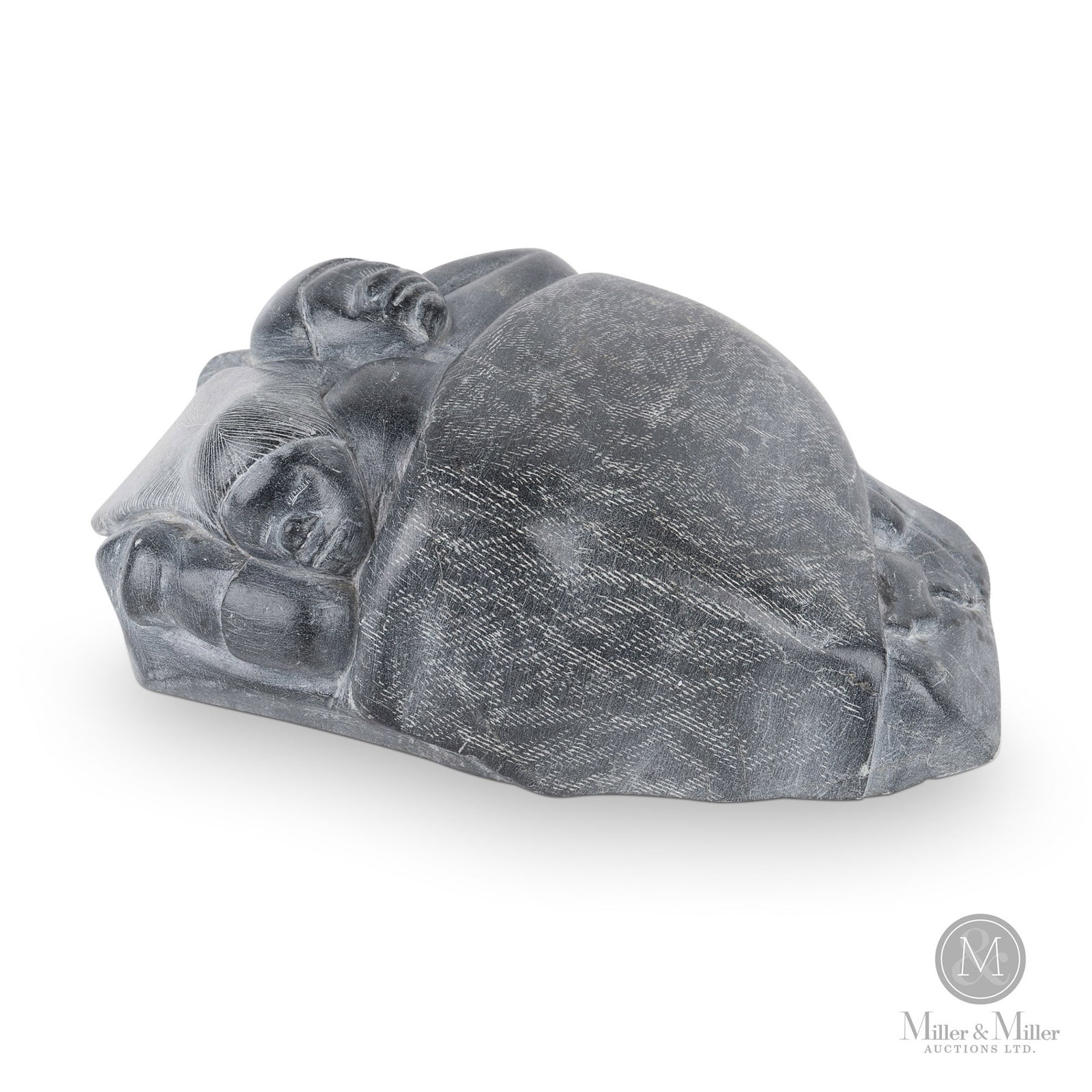 Joannassie Smith (1925-1963) Puvirnituq: Joannassie Smith (1925-1963) Puvirnituq. A sculpture of a sleeping couple with the woman having long flowing hair. Original price tag on the base likely the Canadian Handicrafts Guild. Works by Joanas