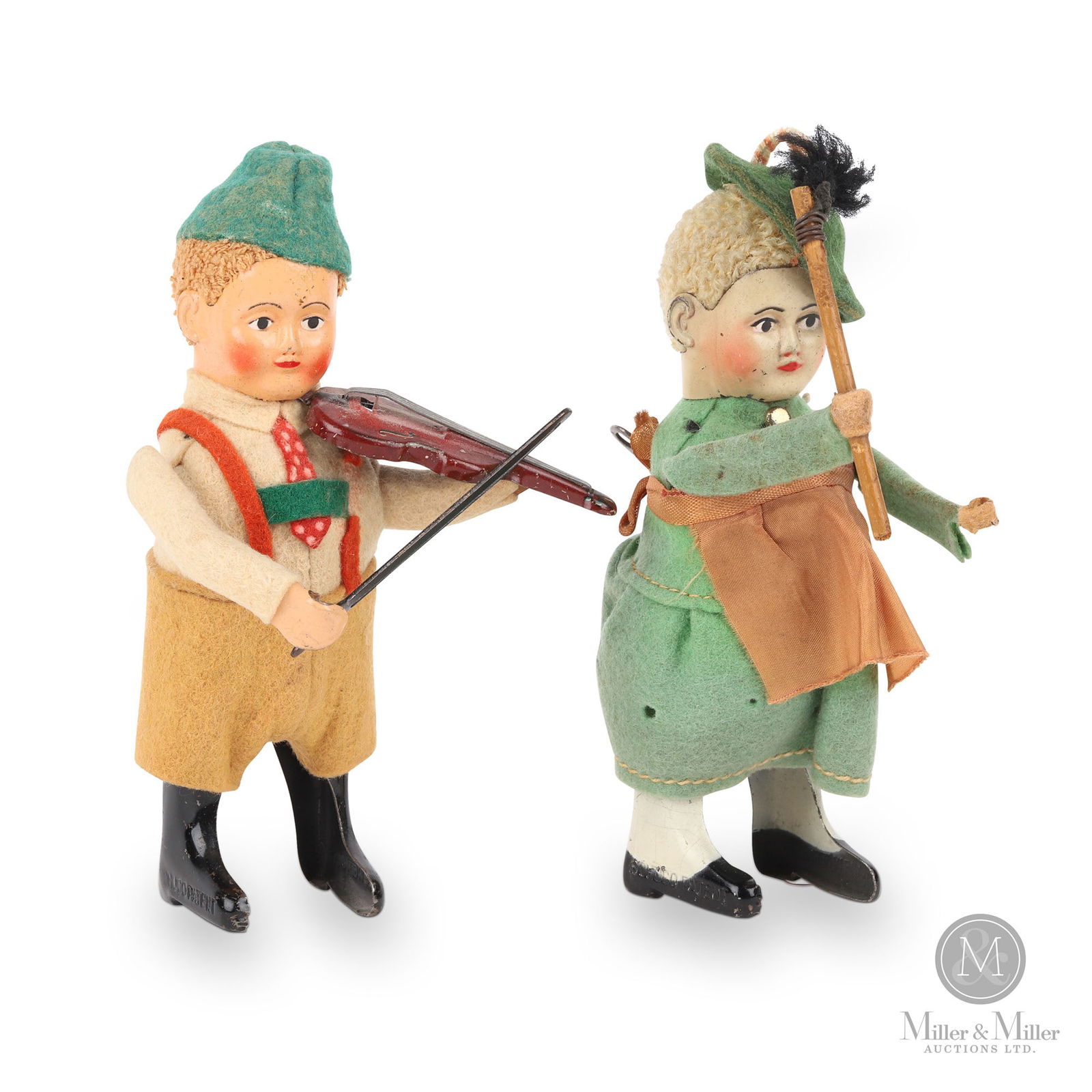 Schuco Tyrolian Violinist & Maid: German. 1930s. Tinplate, fabric. Marked, on sides of feet. 5" height. The Howie Meyer Legacy Collection.
