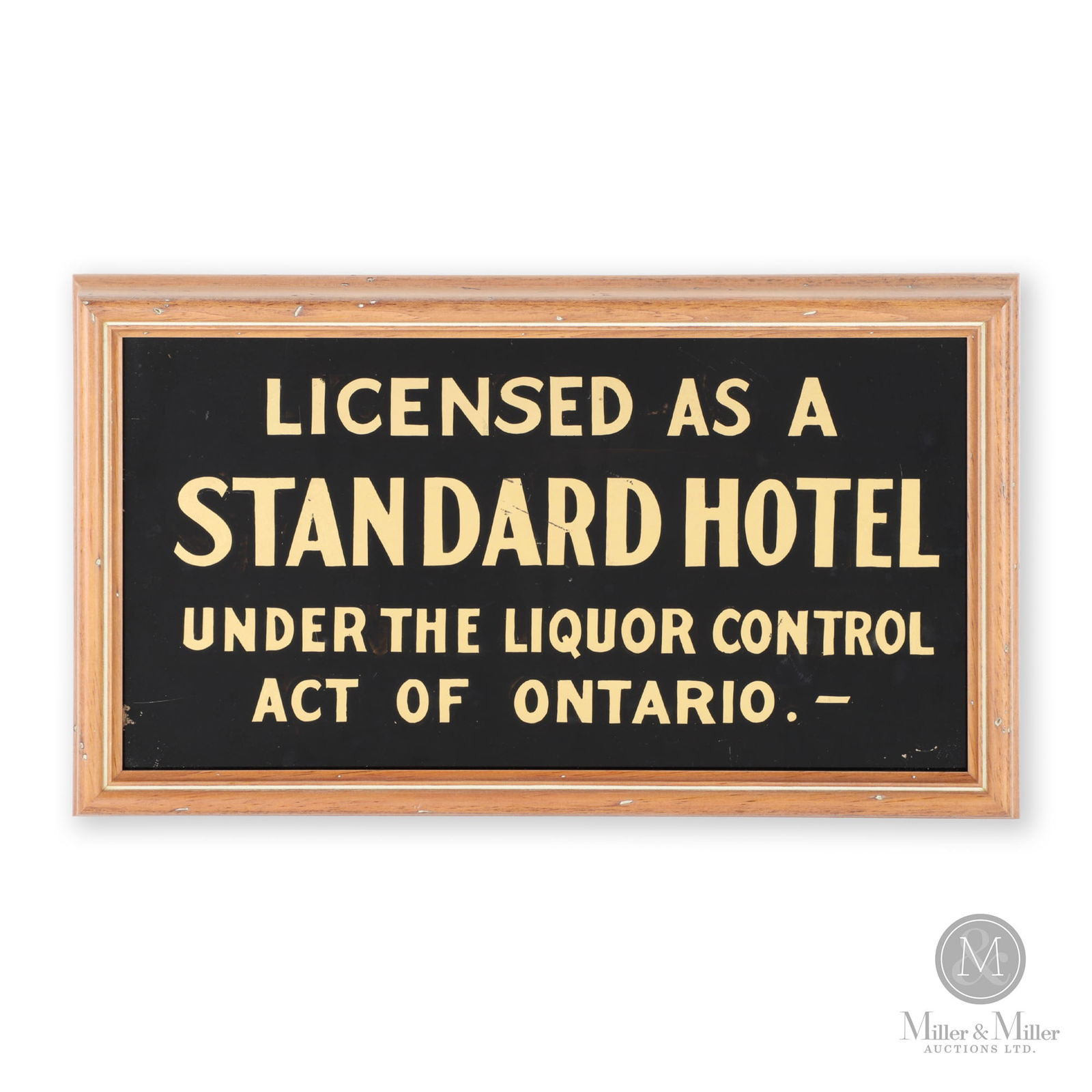 Ontario Liquor Control Act Standard Hotel Sign: Canadian. 1930s. Reverse painted glass. 16.5" x 9.5" x 2". From the William Robert Wilson Collection.