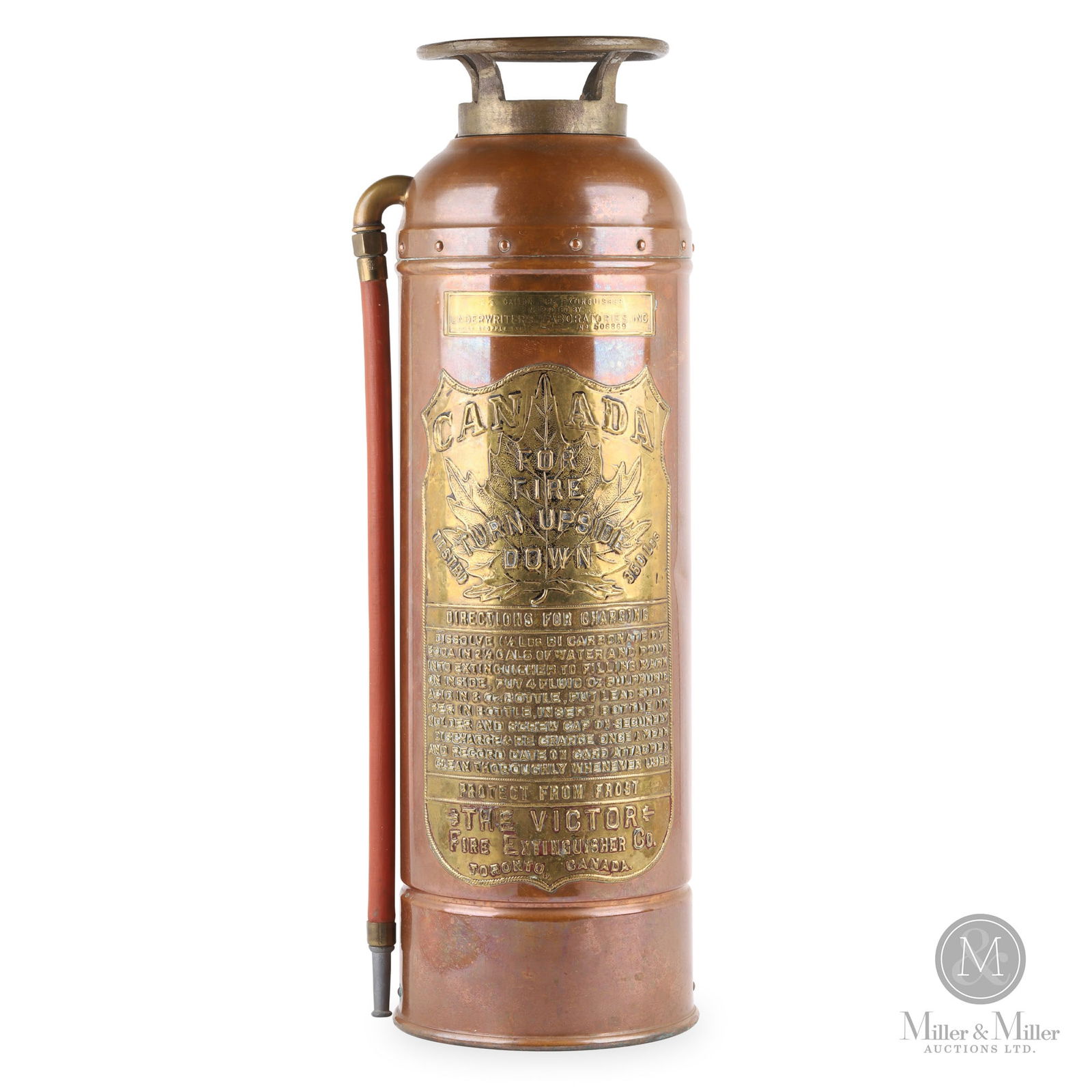 Victor Co. Toronto "Canada" Fire Extinguisher: Canadian. 1920s. Copper, brass. Marked, "The Victor Fire Extinguisher Co. Toronto Canada", on lower badge. 23.75" x 7.25" x 7.25". From the William Robert Wilson Collection.