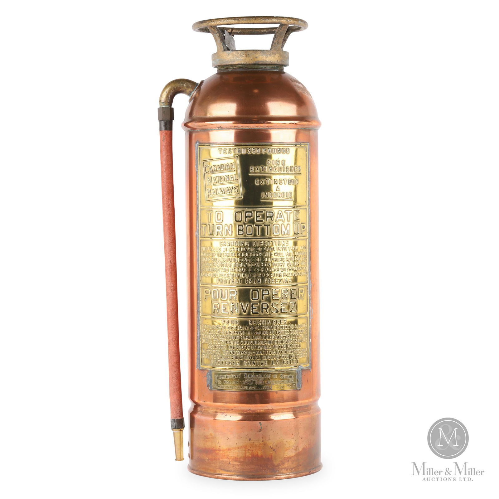 Canadian National Railways Fire Extinguisher: Canadian. 1950s. Copper, brass. Marked, with the Canadian National Railways logo, at the top left corner of the embossed face badge. 23.75" x 7" x 7". From the William Robert Wilson Collection.