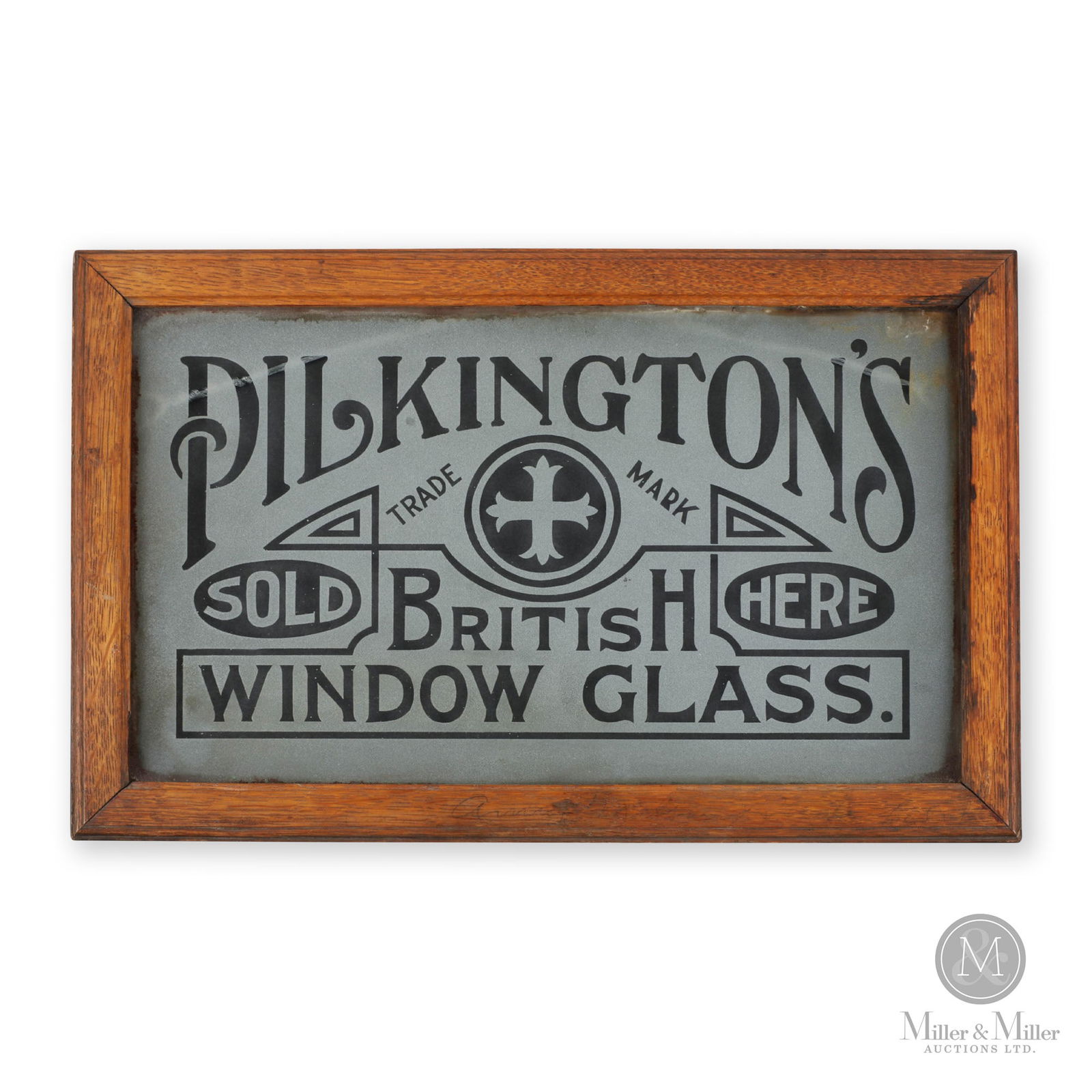 Pilkington's British Window Glass Sign: Canadian. 1910s. Acid-etched glass in original oak frame. Rare. 16.75" x 10.75" x 0.75". From the William Robert Wilson Collection.