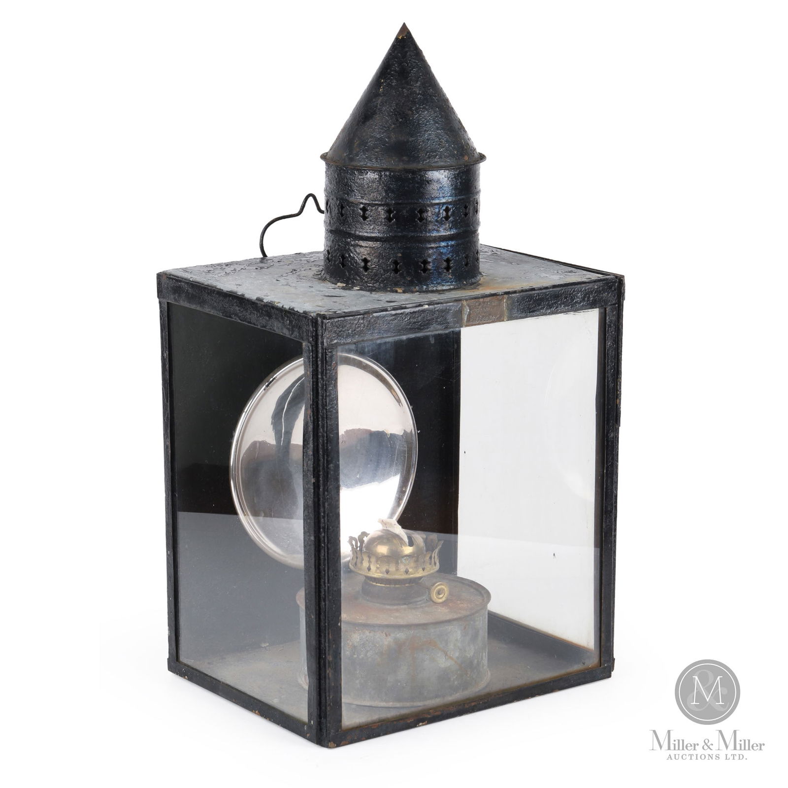 N.L. Piper Railway Station Platform Lamp: Canadian. 1900s. Painted galvanized metal, glass. Tagged, "N.L. Piper Railway Supply Ltd. Toronto", on exterior. 23" x 13" x 10". From the William Robert Wilson Collection.