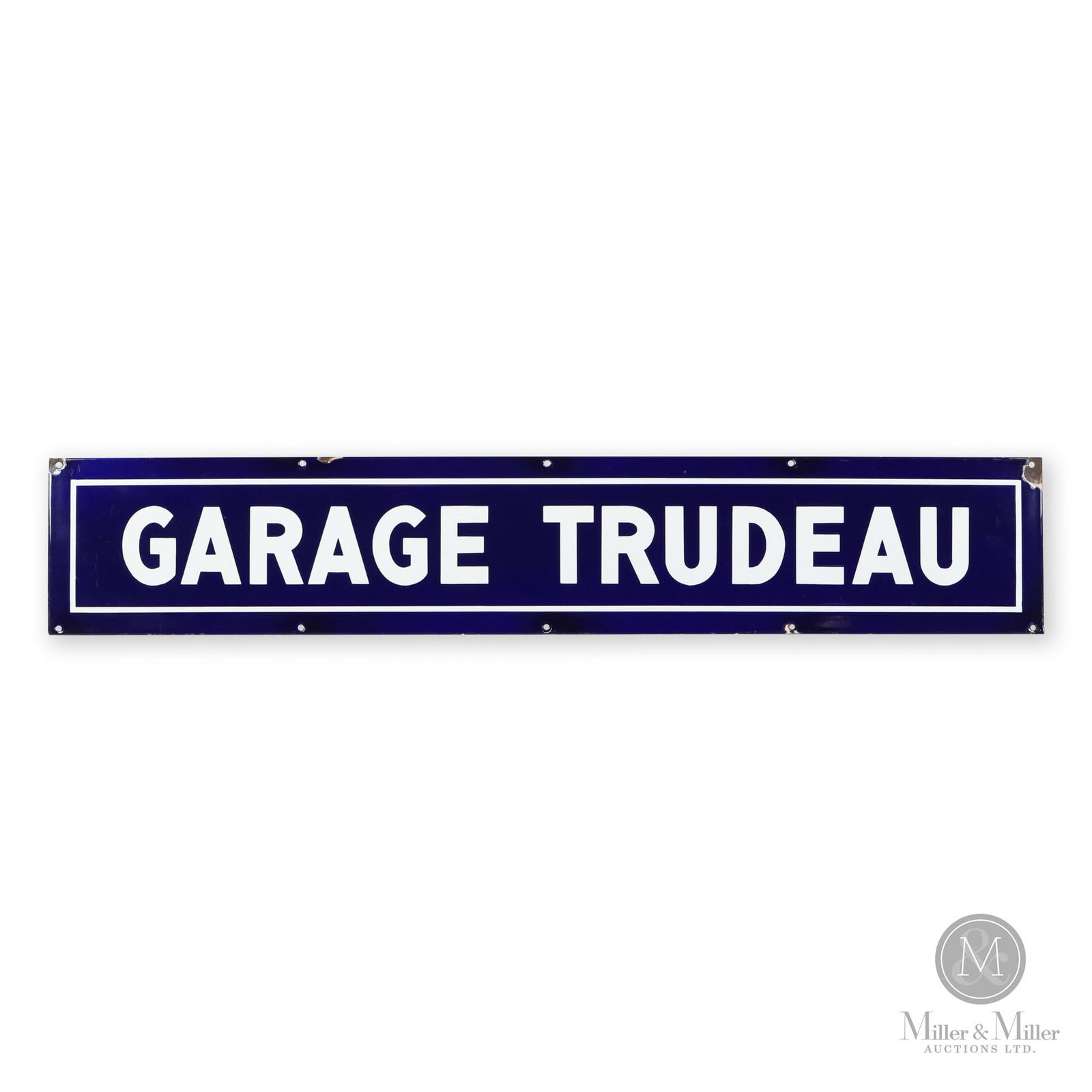 Garage Trudeau Sign: Canadian. 1920s. Single-sided porcelain (SSP). 8" x 45". From the William Robert Wilson Collection.