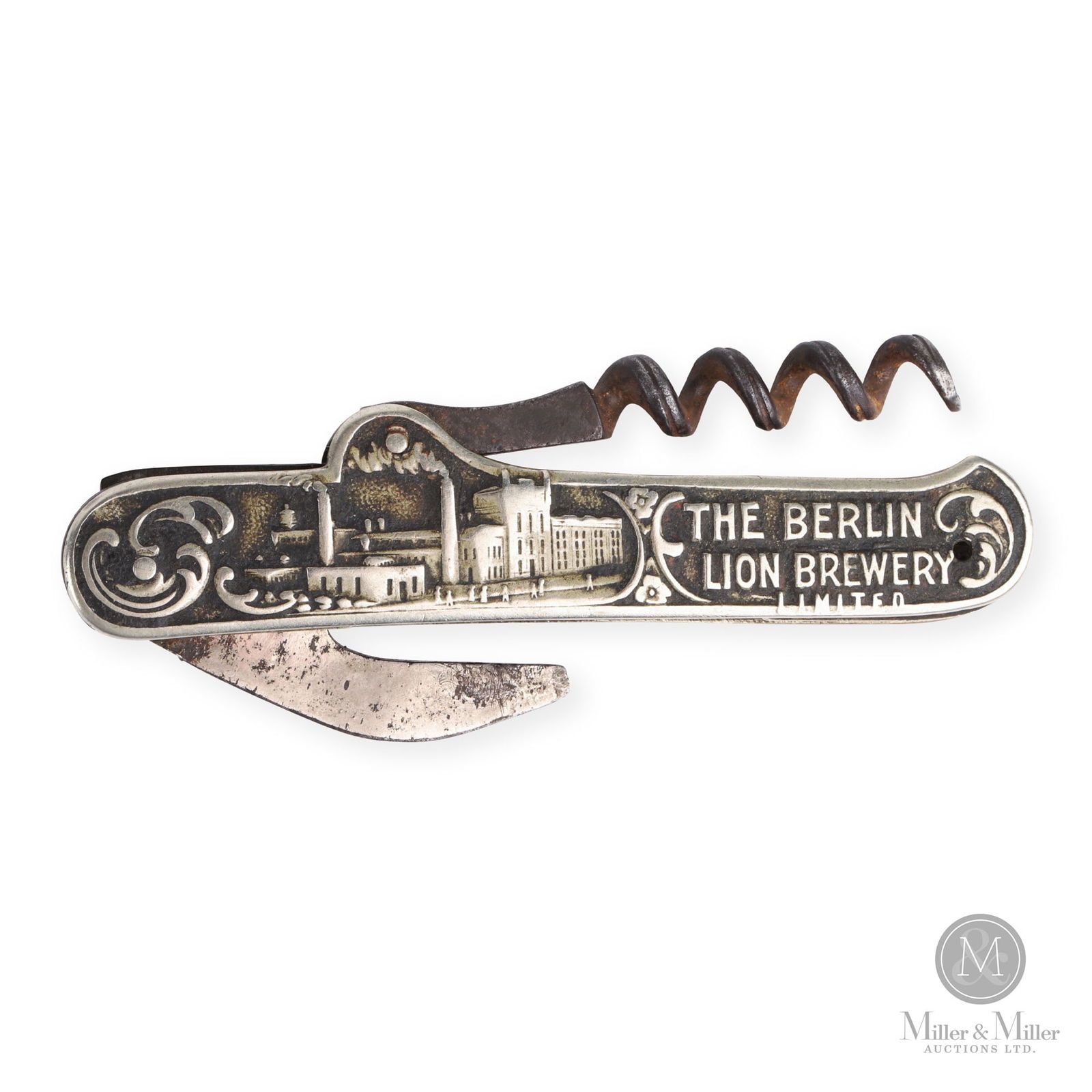 Berlin Lion Brewery Pocket Knife: Canadian. 1900s. Stamped metal sides. 12" x 17.5" x 13.25". From the William Robert Wilson Collection.