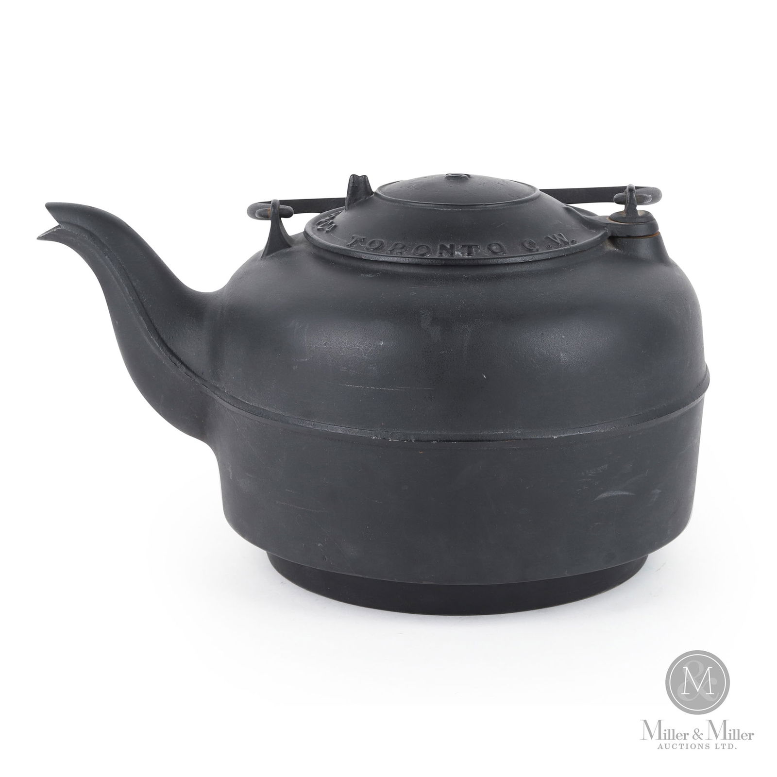 J. R. Armstrong Toronto, C.W. No. 10 Cast Iron Kettle: Canadian. 1850s. Painted cast iron. Marked, "J.R. Armstrong & Co. Toronto. C.W.", on cover in casting. 9" x 11" x 15". From the William Robert Wilson Collection.