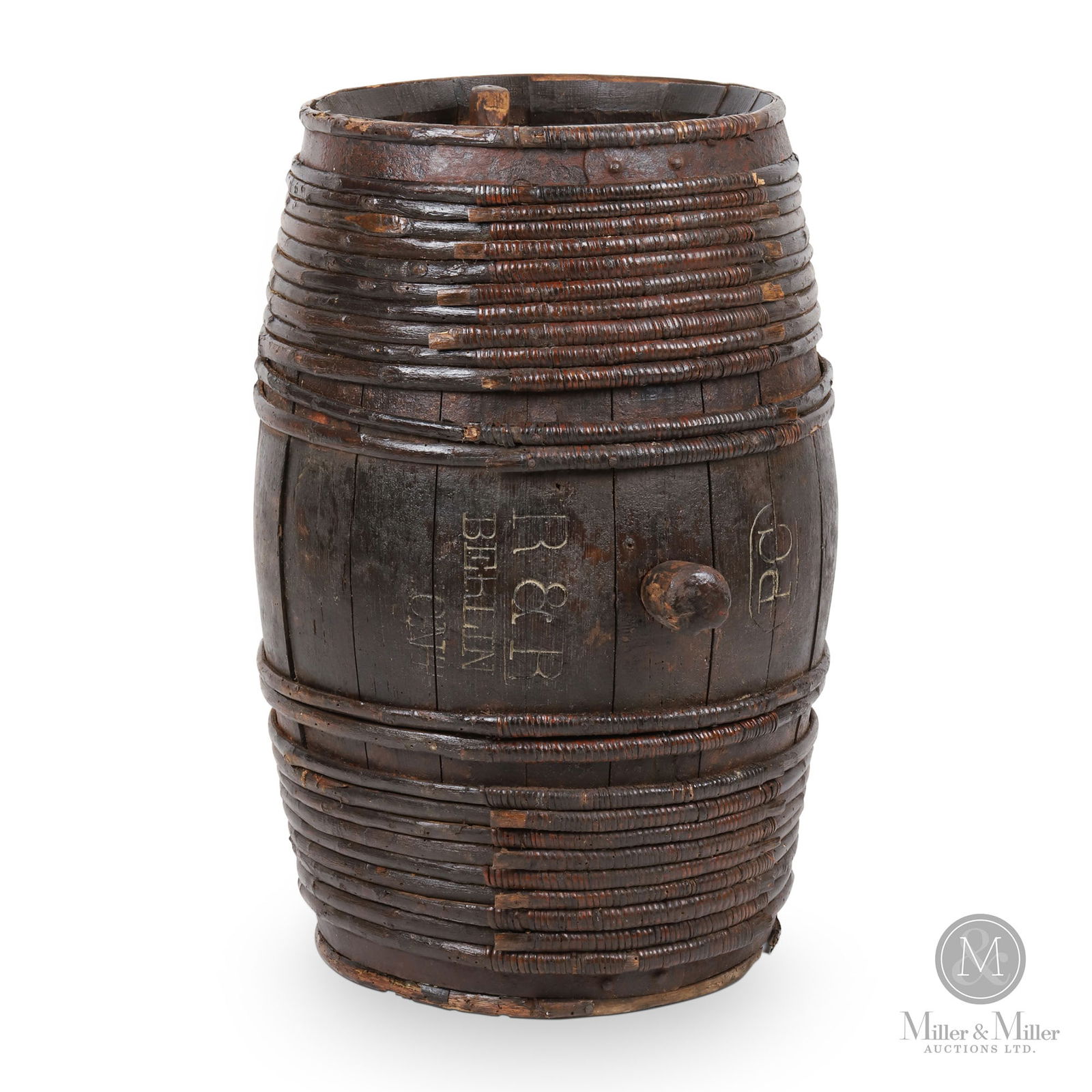 Berlin, Ontario Storage Barrel: Canadian. 1890s. Wood. Features cane-bound retention rings. Stamped, "PC R&R Berlin Ont", on front. 24" x 15" x 15". From the William Robert Wilson Collection.