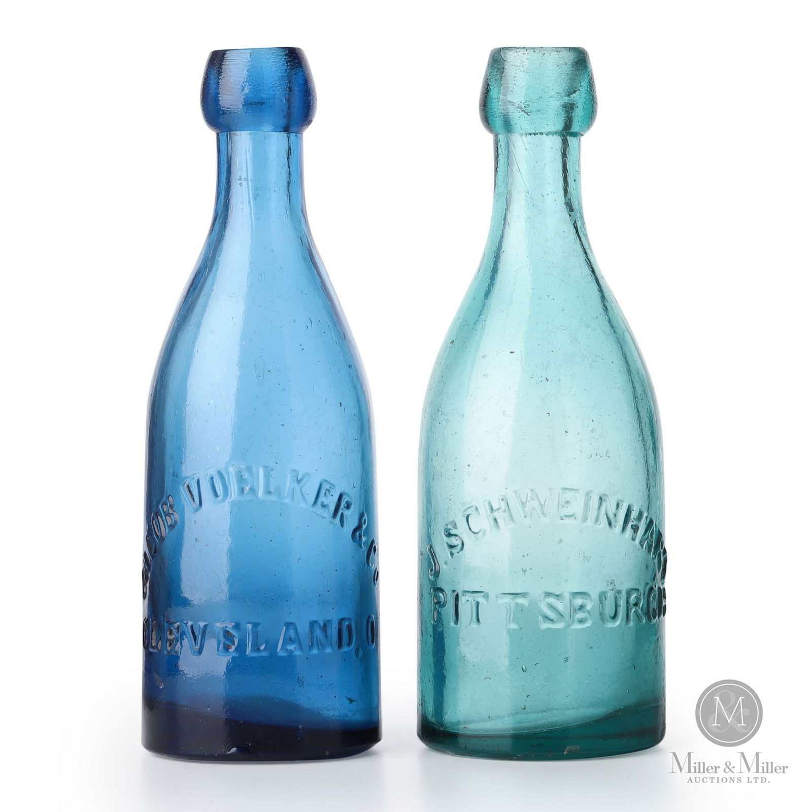 J. Schweinhart Pittsburg & Jacob Voelker & Co. Cleveland Soda Water Bottles: American. 1870s. Glass. 7.5" x 2.5" x 2.5" each. From the William Robert Wilson Collection.