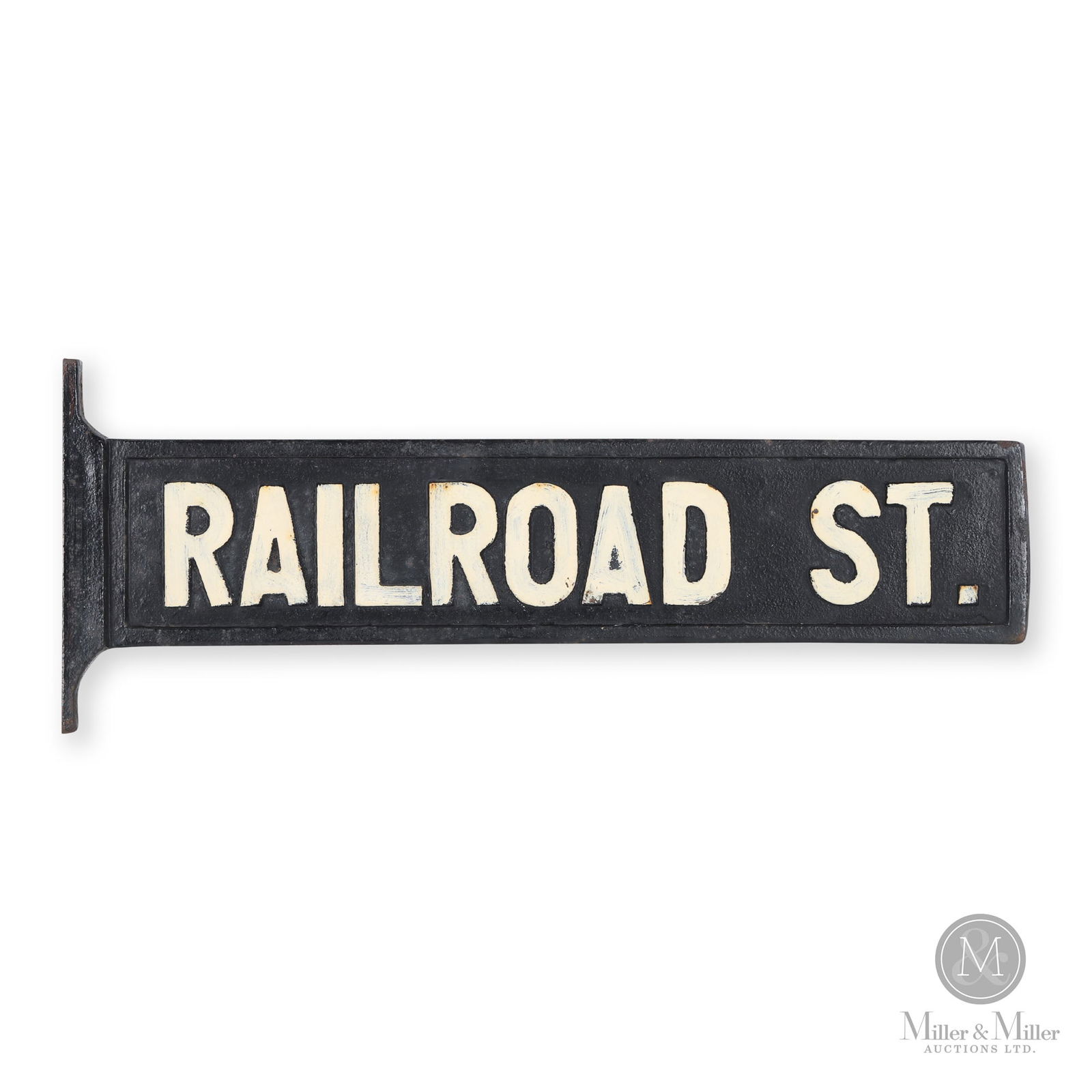 Cast Iron "Railroad St." Road Sign: Canadian or American. 1920s. Cast iron. Marked, with casting mark of Glass Co. Sign: 4" x 17.25". From the William Robert Wilson Collection.